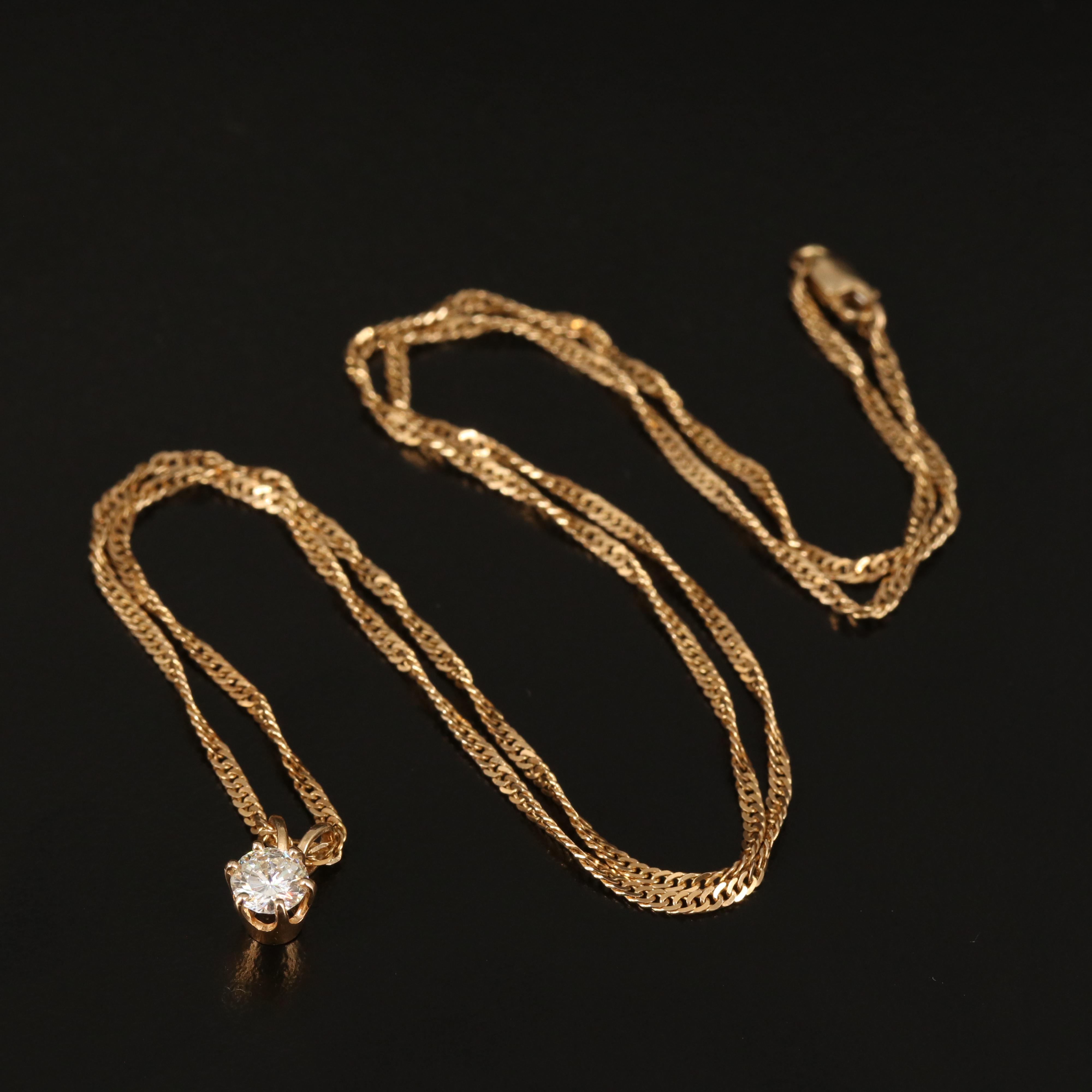 0.38 CT Diamond Solitaire Pendant on Singapore Chain Necklace in 14K