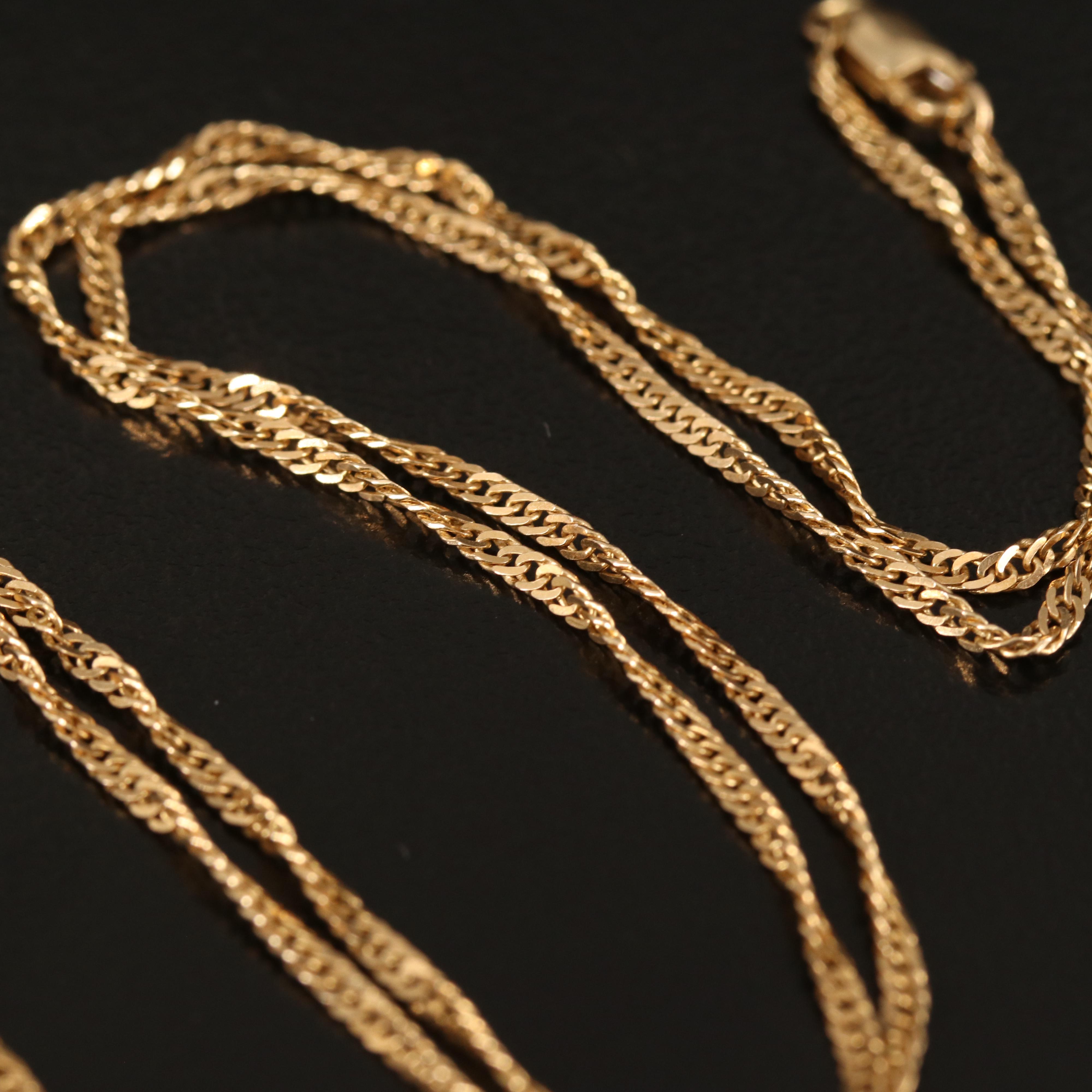 0.38 CT Diamond Solitaire Pendant on Singapore Chain Necklace in 14K