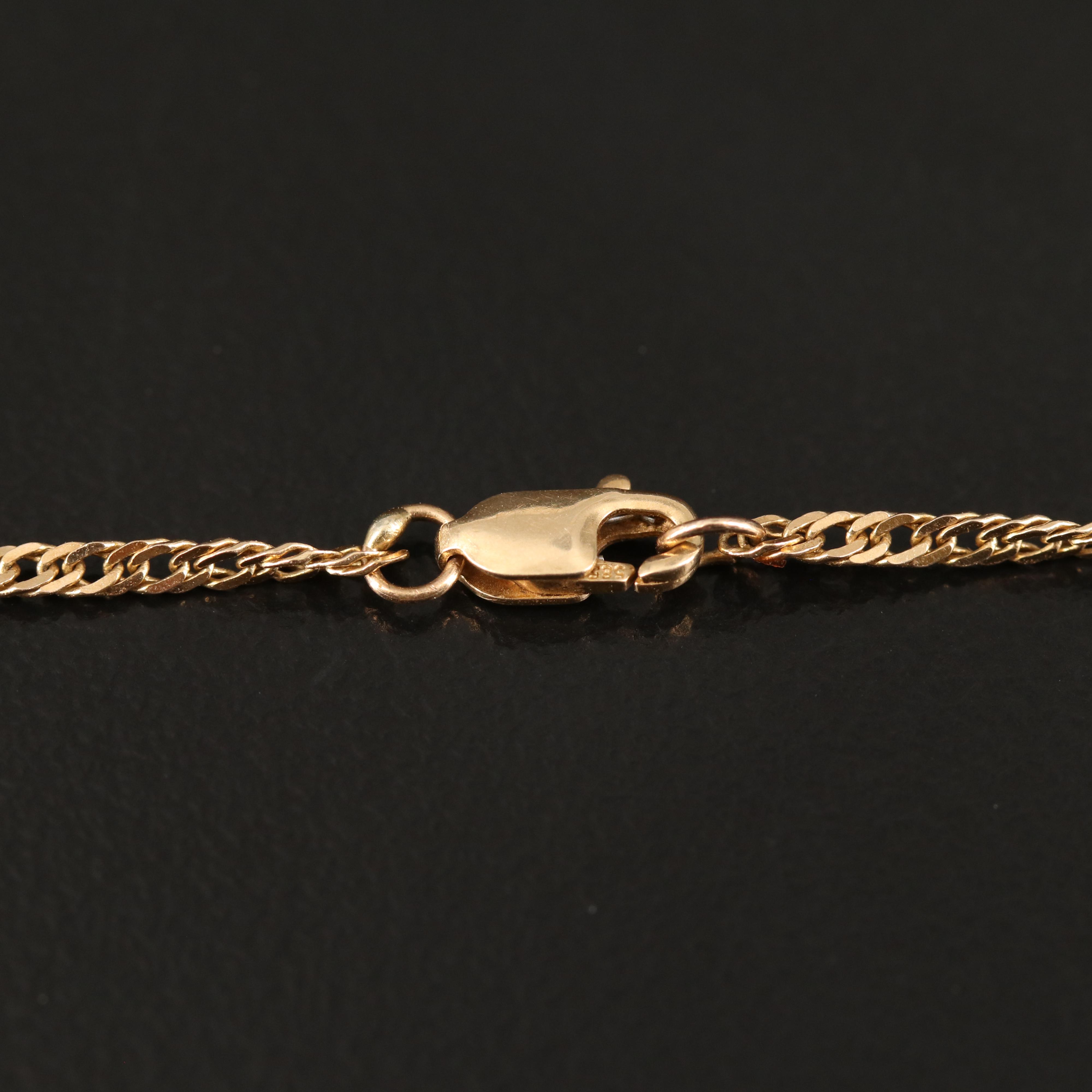 0.38 CT Diamond Solitaire Pendant on Singapore Chain Necklace in 14K