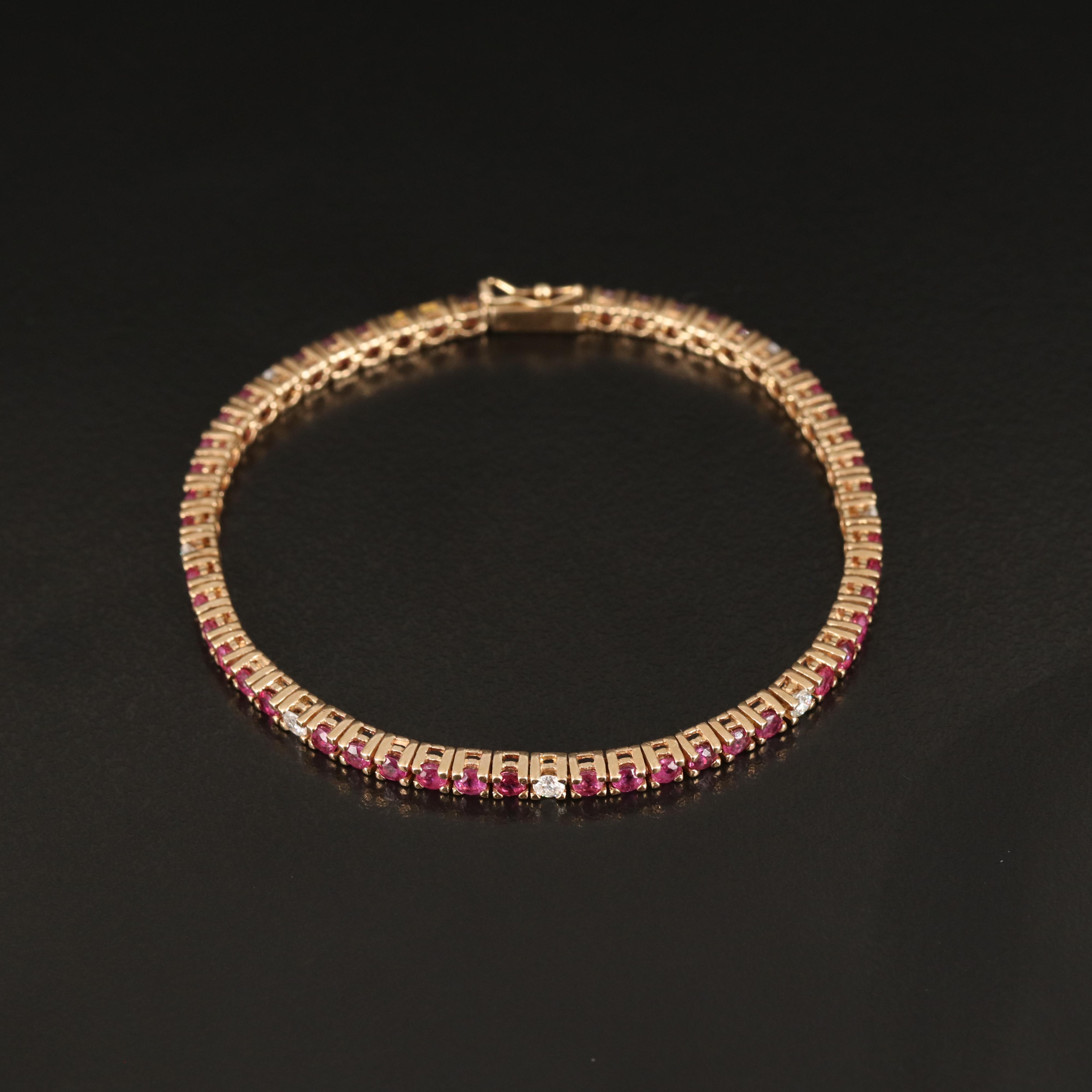 14K 0.48 CTW Diamond and Ruby Station Line Bracelet