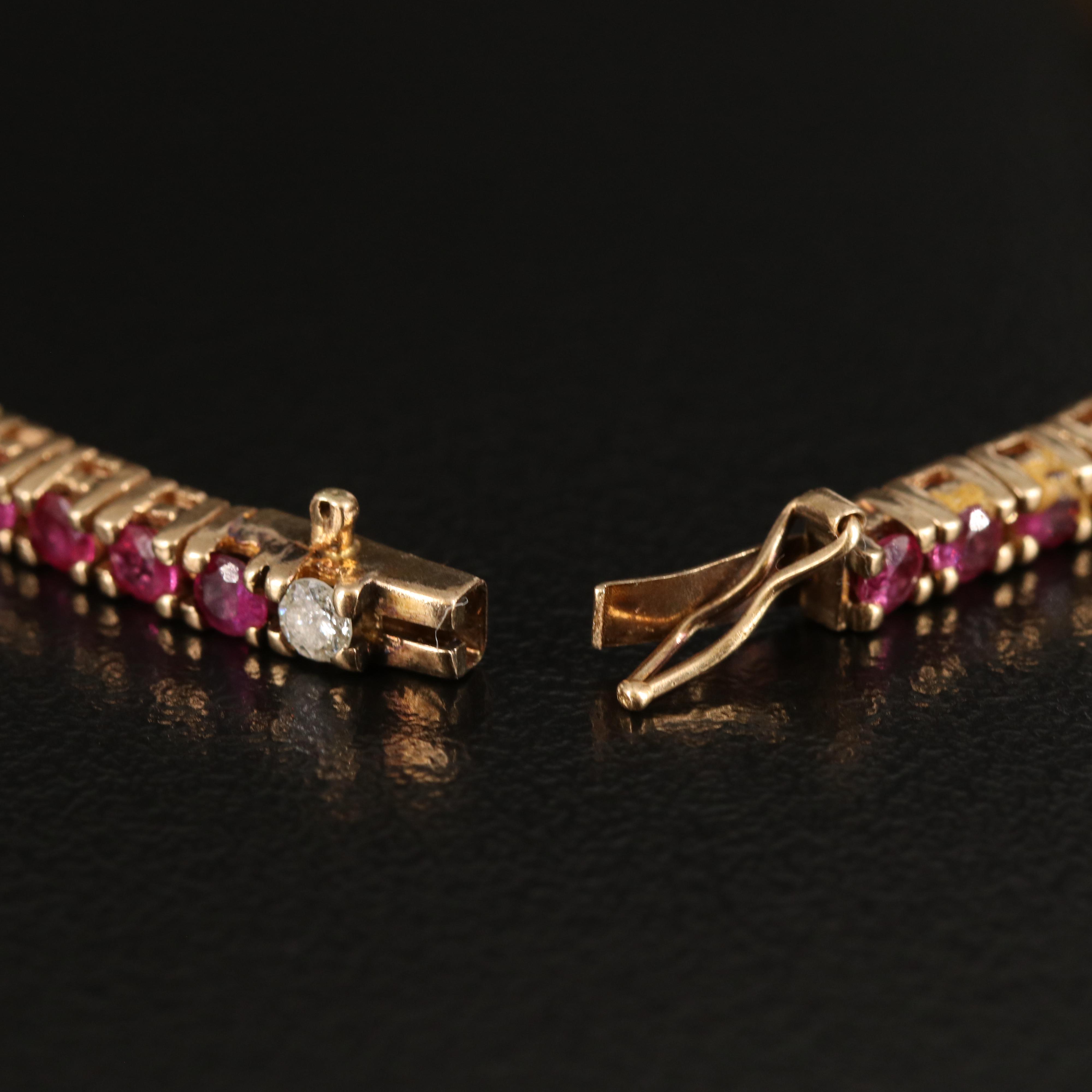 14K 0.48 CTW Diamond and Ruby Station Line Bracelet
