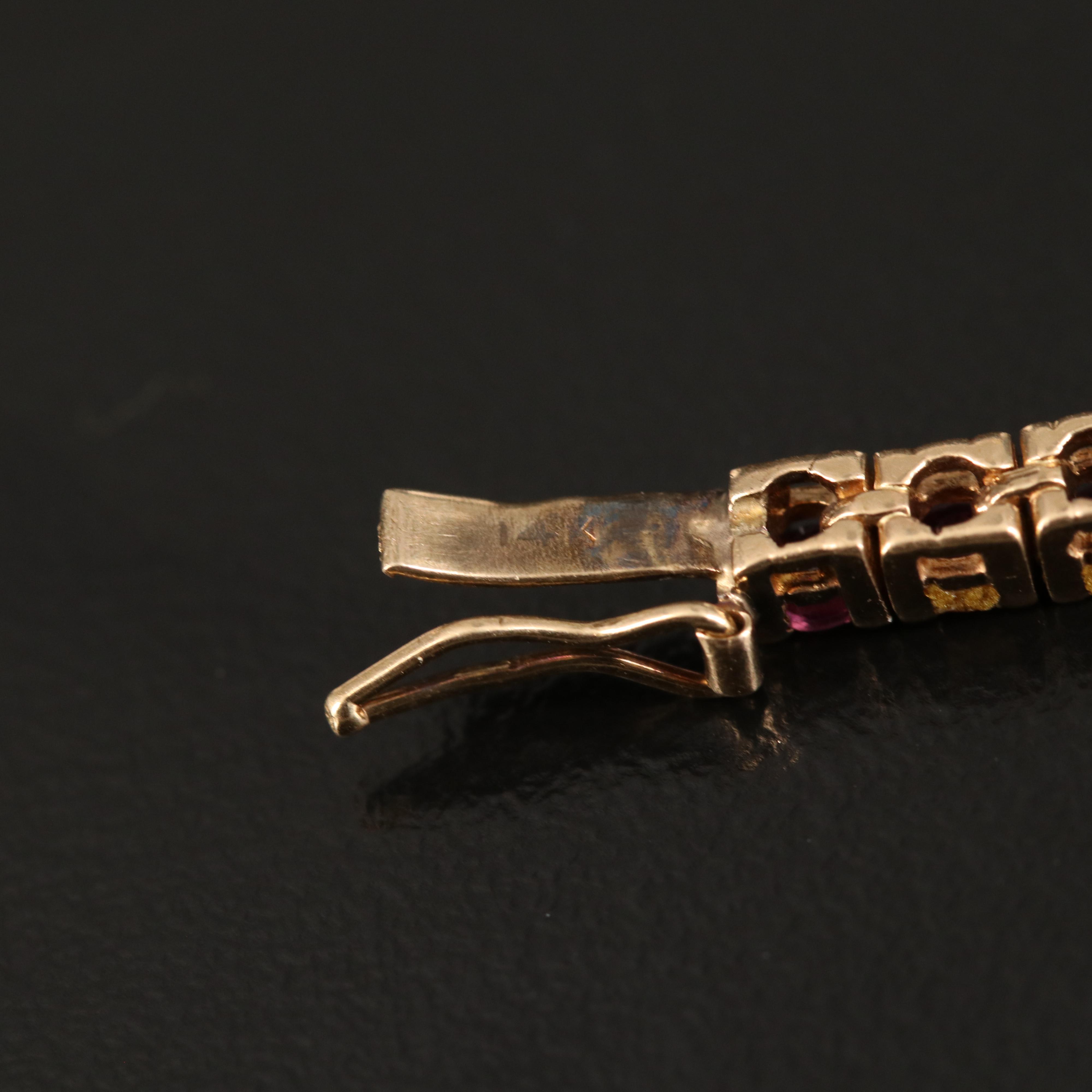 14K 0.48 CTW Diamond and Ruby Station Line Bracelet