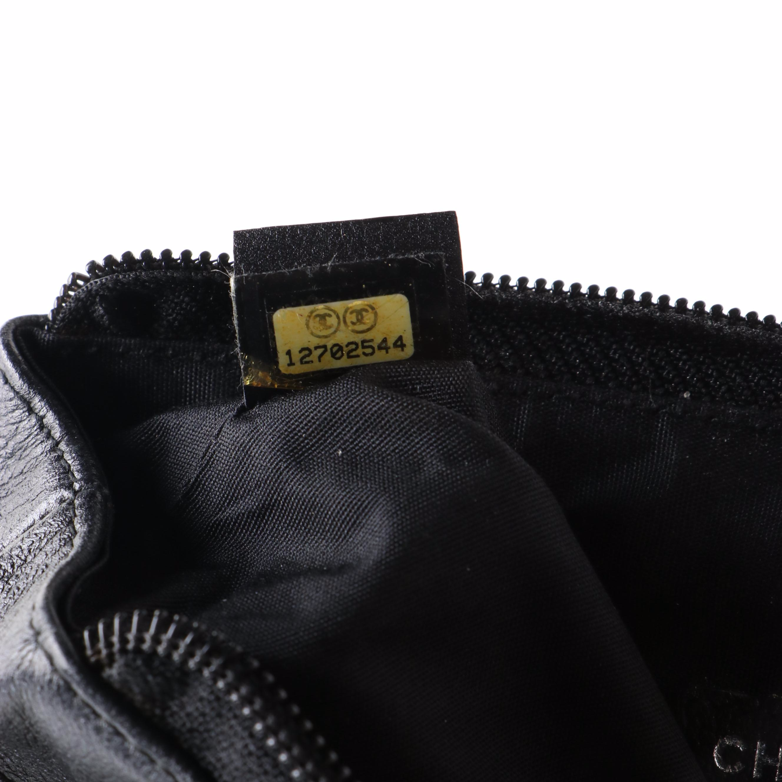 Chanel Camellia Leather Zip Pouch