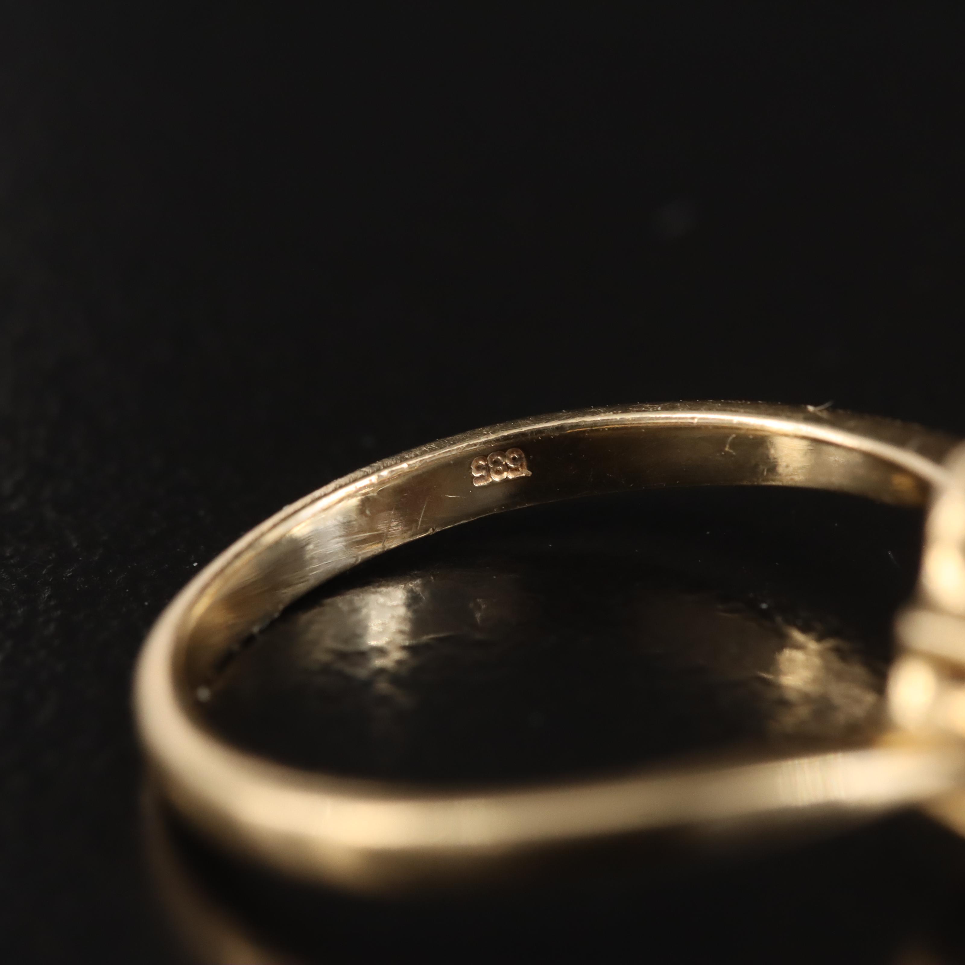 14K Ruby and Diamond Bypass Ring