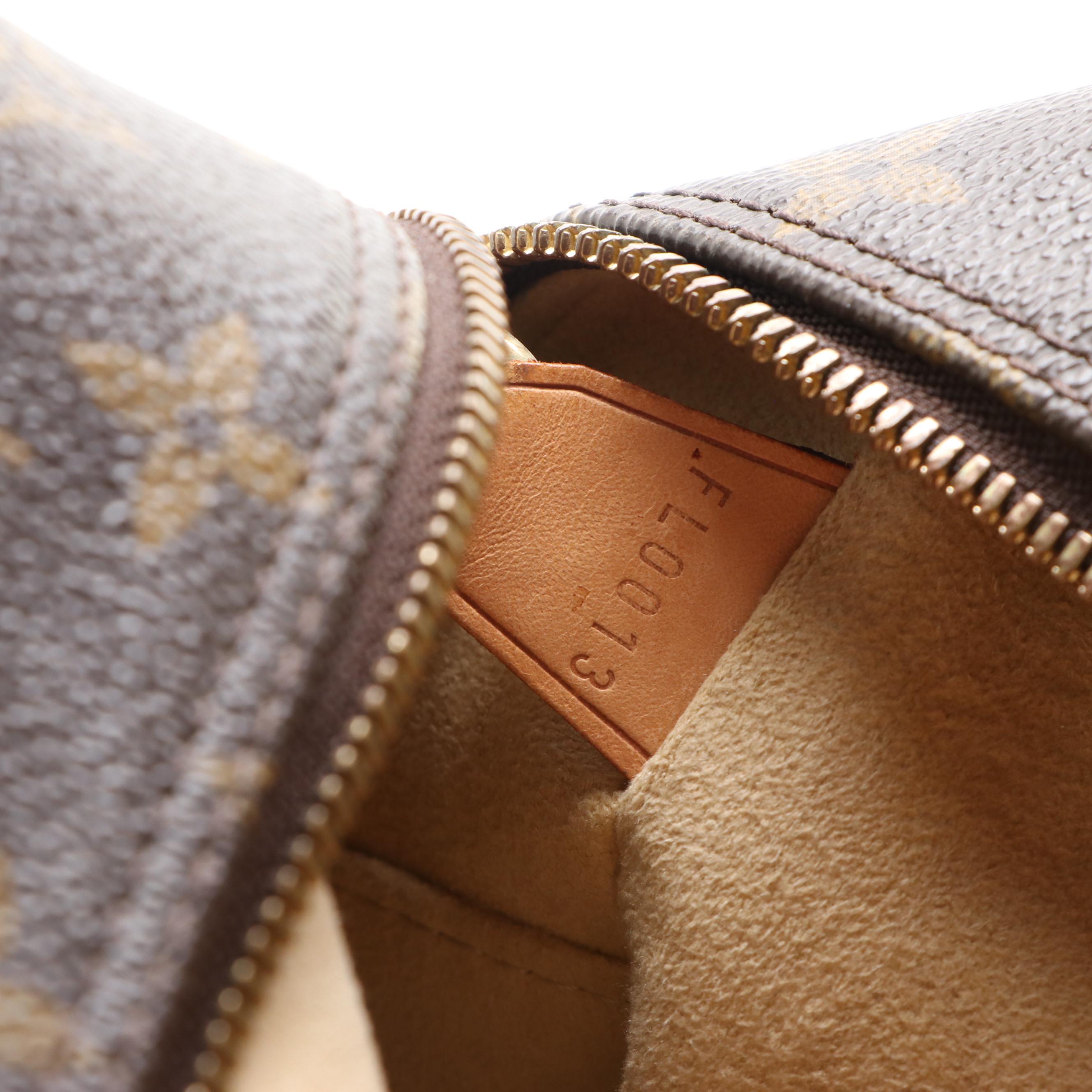 Louis Vuitton Cité GM Shoulder Bag in Monogram Canvas and Vachetta Leather