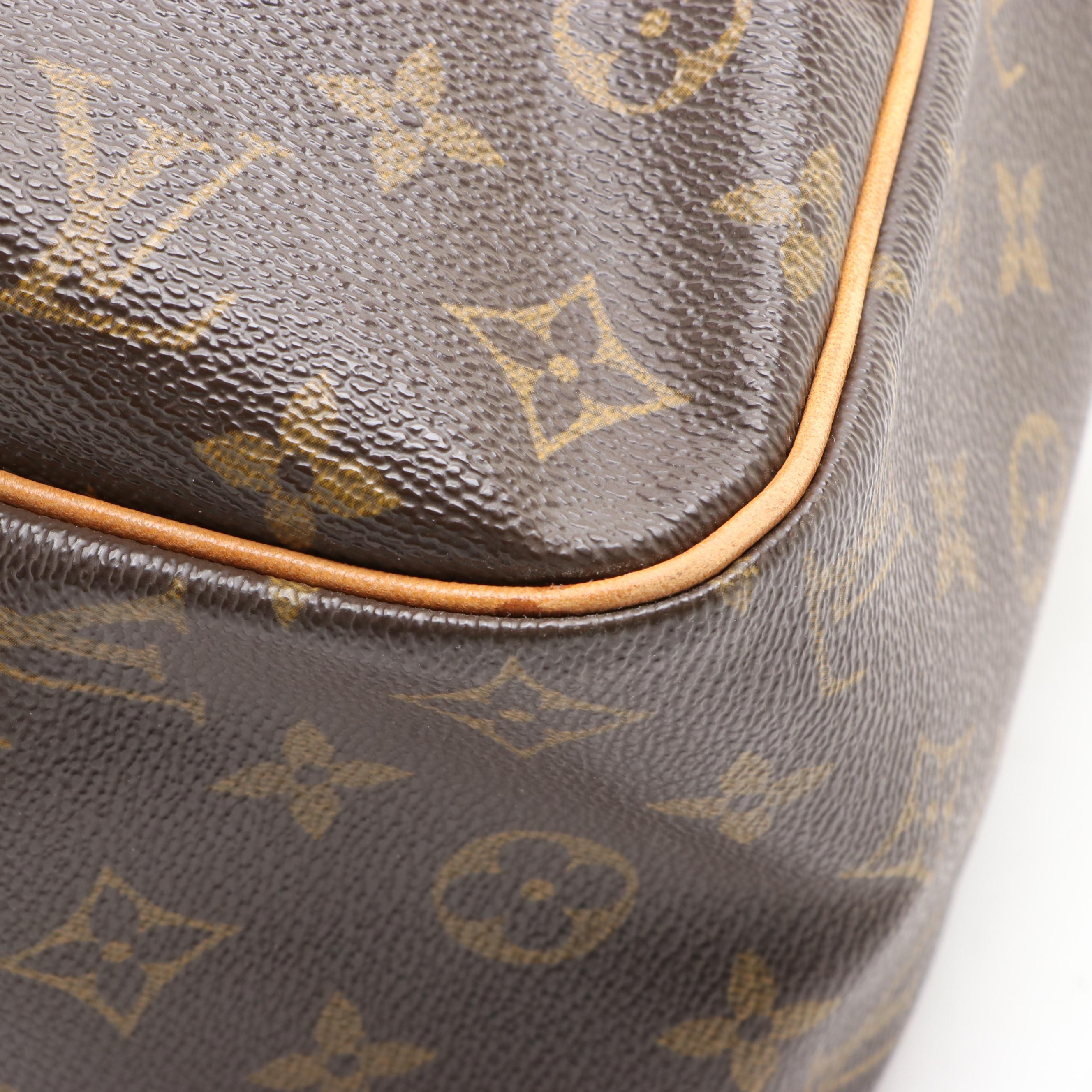 Louis Vuitton Cité GM Shoulder Bag in Monogram Canvas and Vachetta Leather