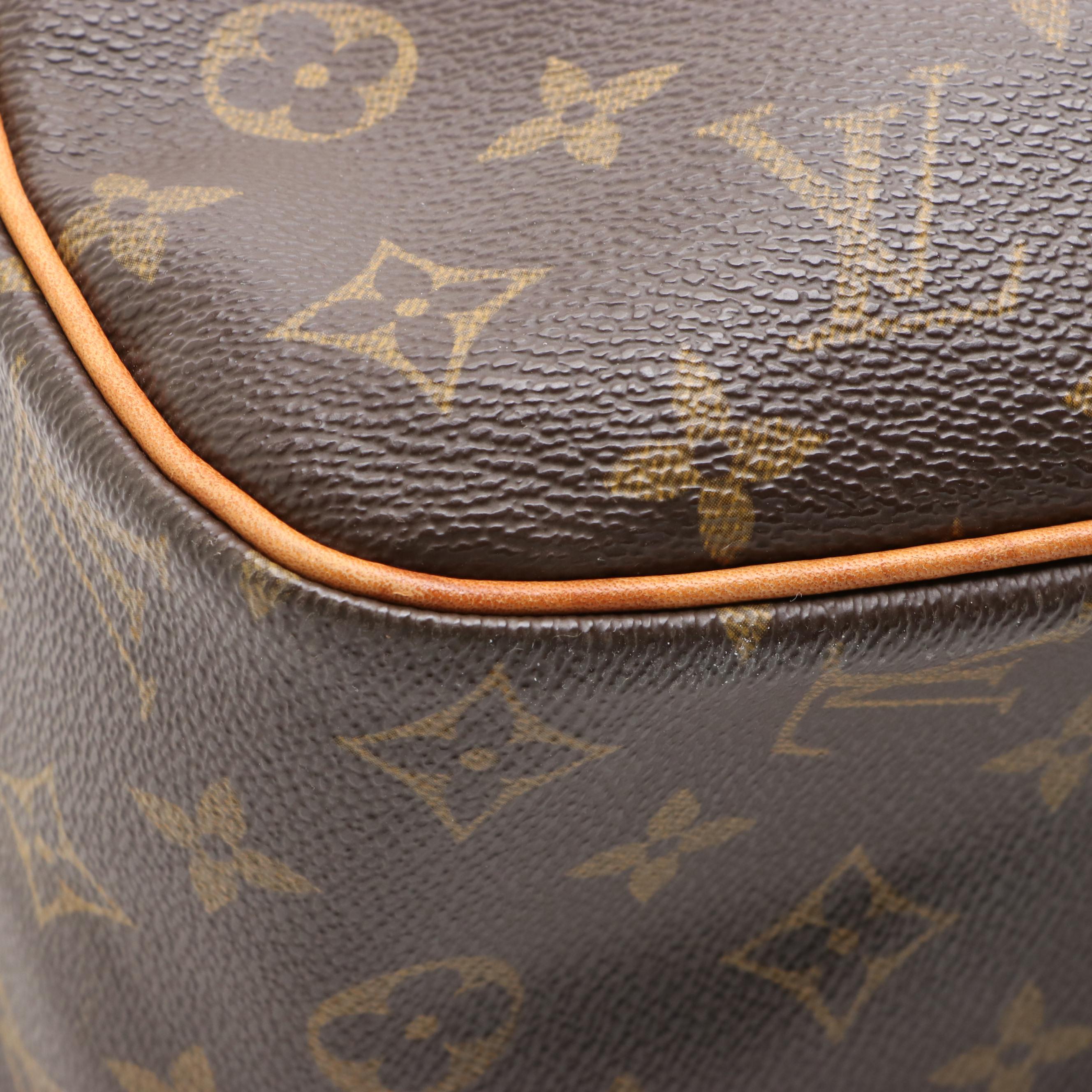 Louis Vuitton Cité GM Shoulder Bag in Monogram Canvas and Vachetta Leather