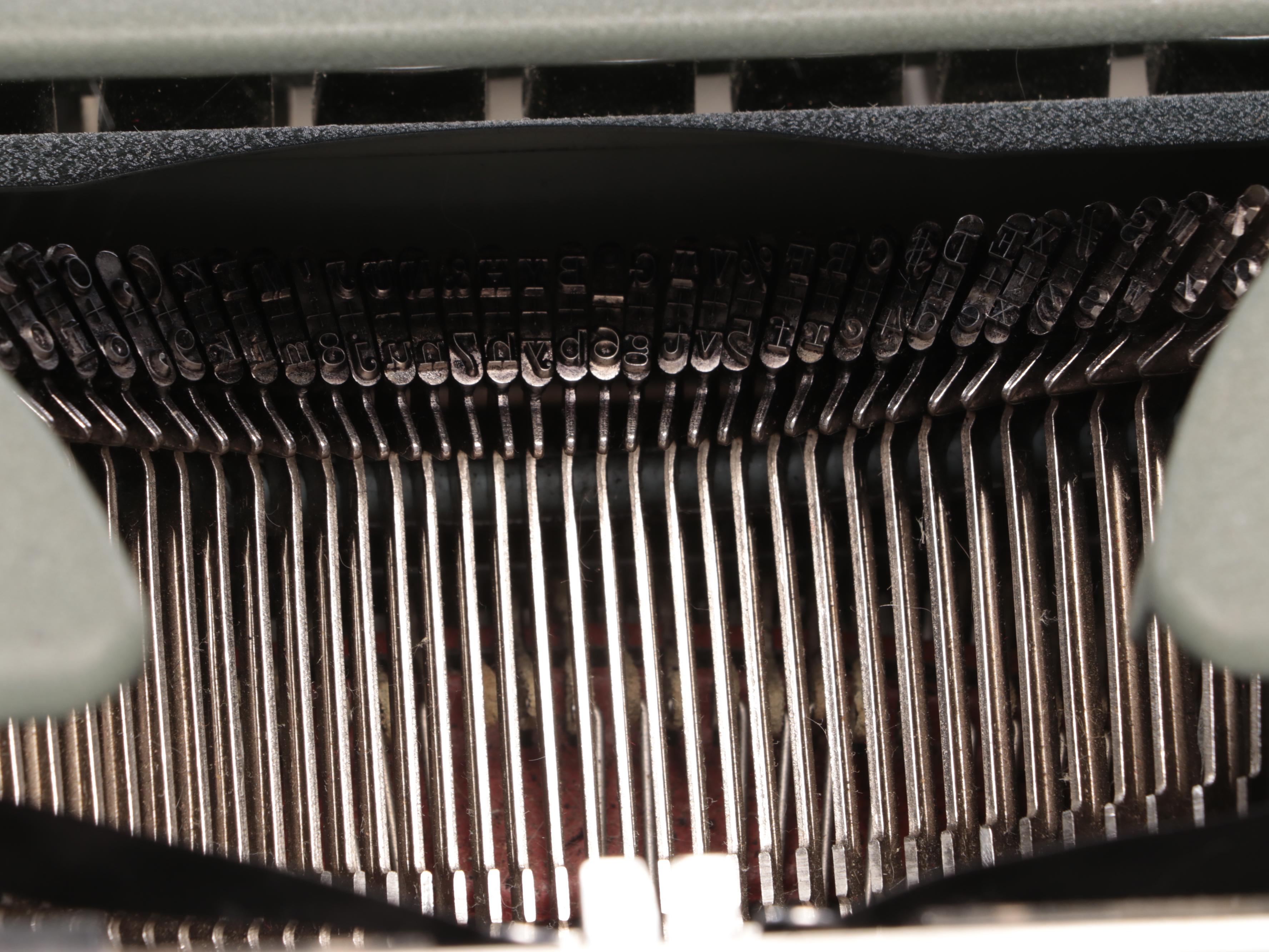 Olympia Portable Typewriter with Case, Mid-20th Century