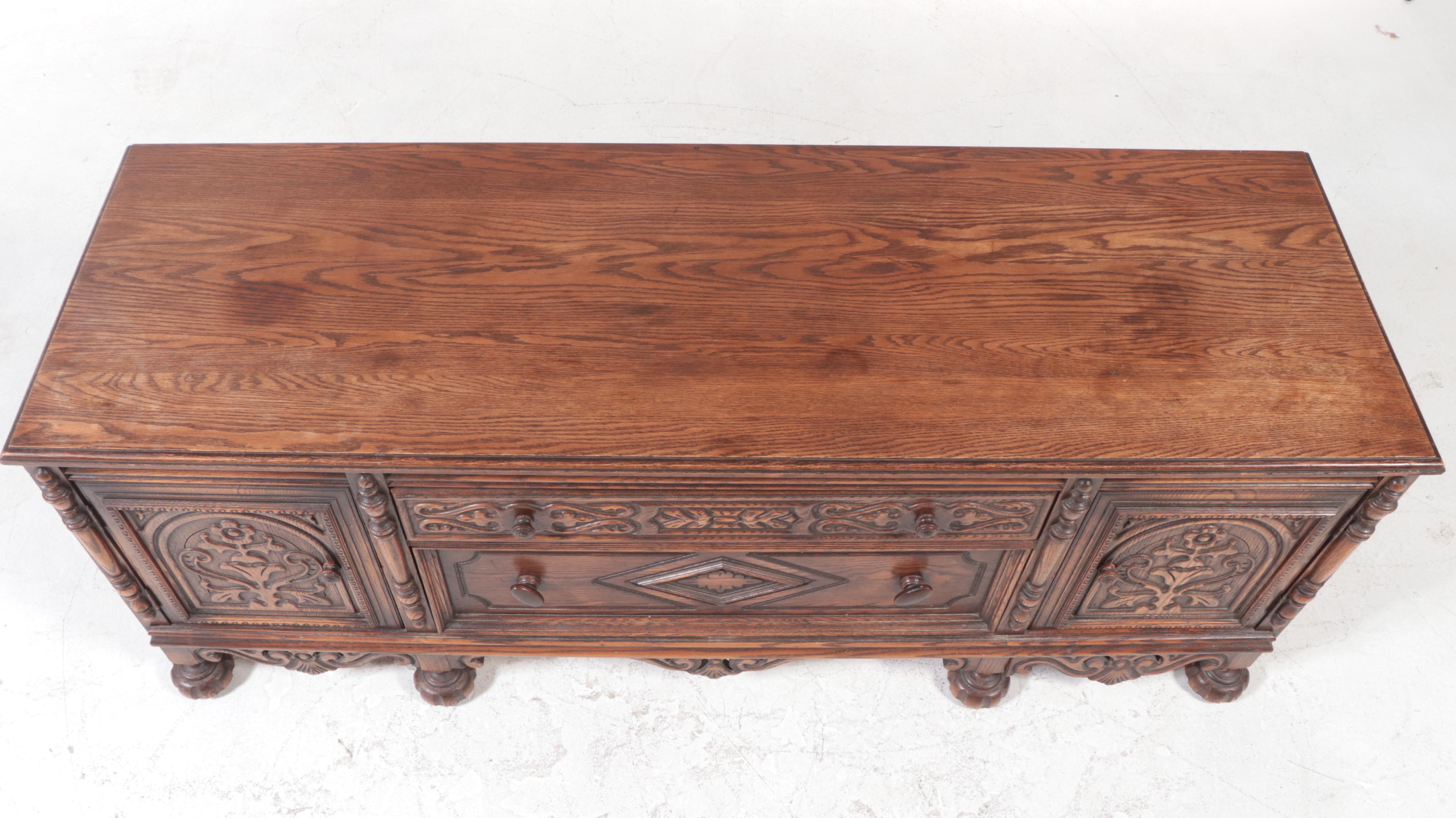 Jake Tennenbaum Co. Jacobean Revival Carved Oak Low Chest, Early 20th Century