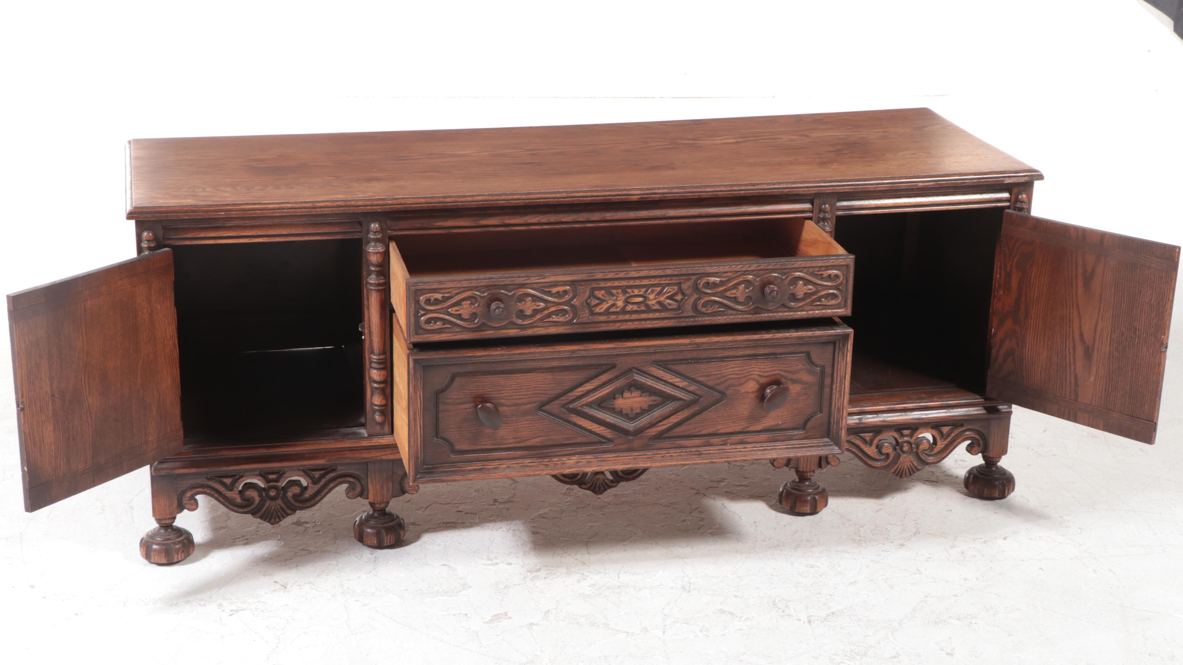 Jake Tennenbaum Co. Jacobean Revival Carved Oak Low Chest, Early 20th Century