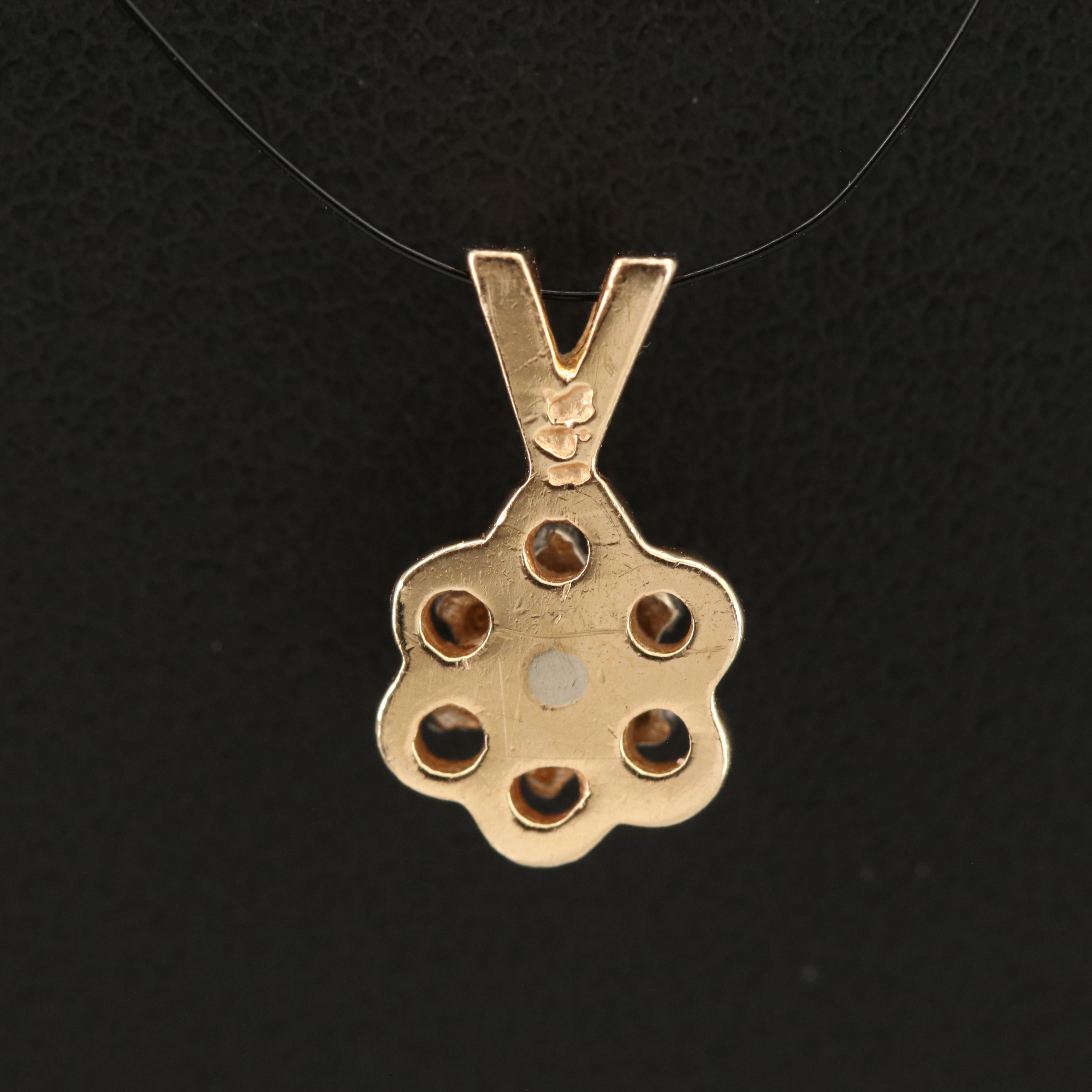 14K 0.13 CTW Diamond Pendant