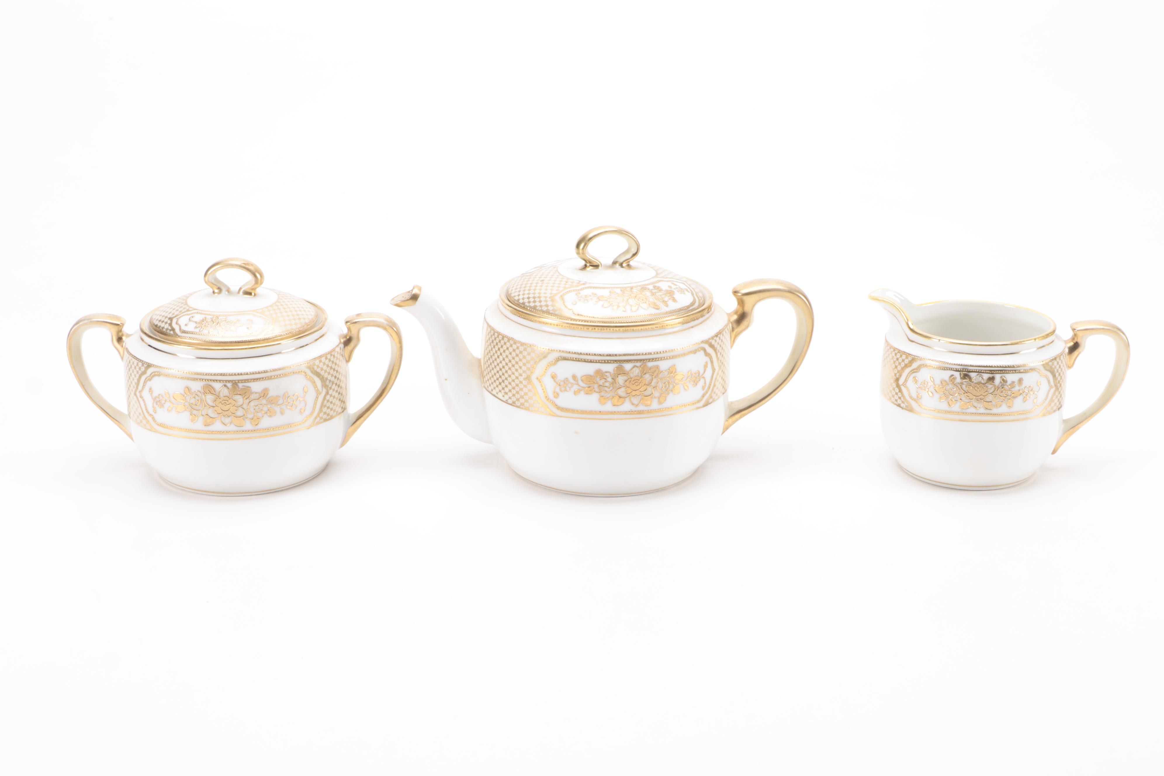 Hand-Painted Noritake Plates and Table Accessories, Early 20th Century