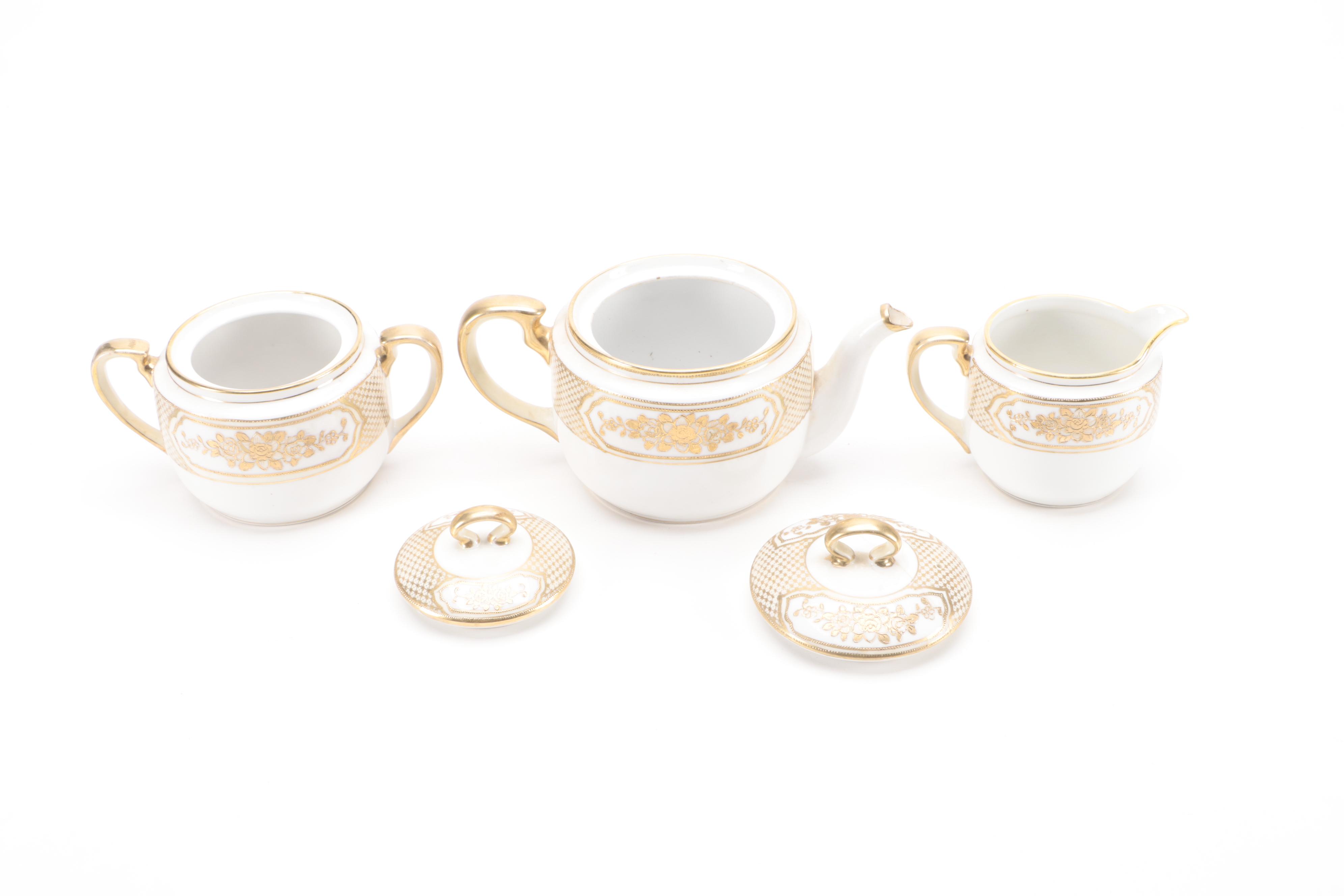 Hand-Painted Noritake Plates and Table Accessories, Early 20th Century