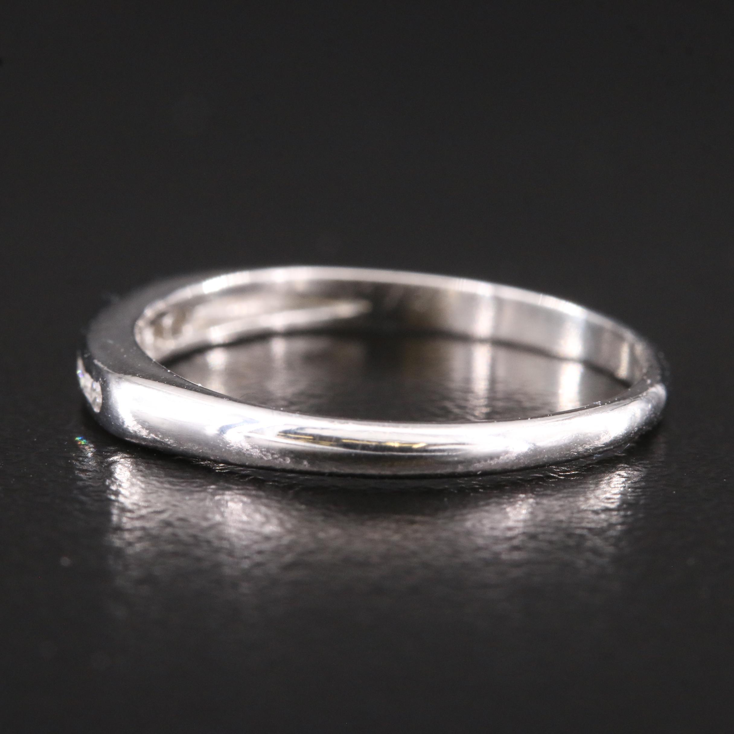 Platinum 0.07 CTW Diamond Channel Band