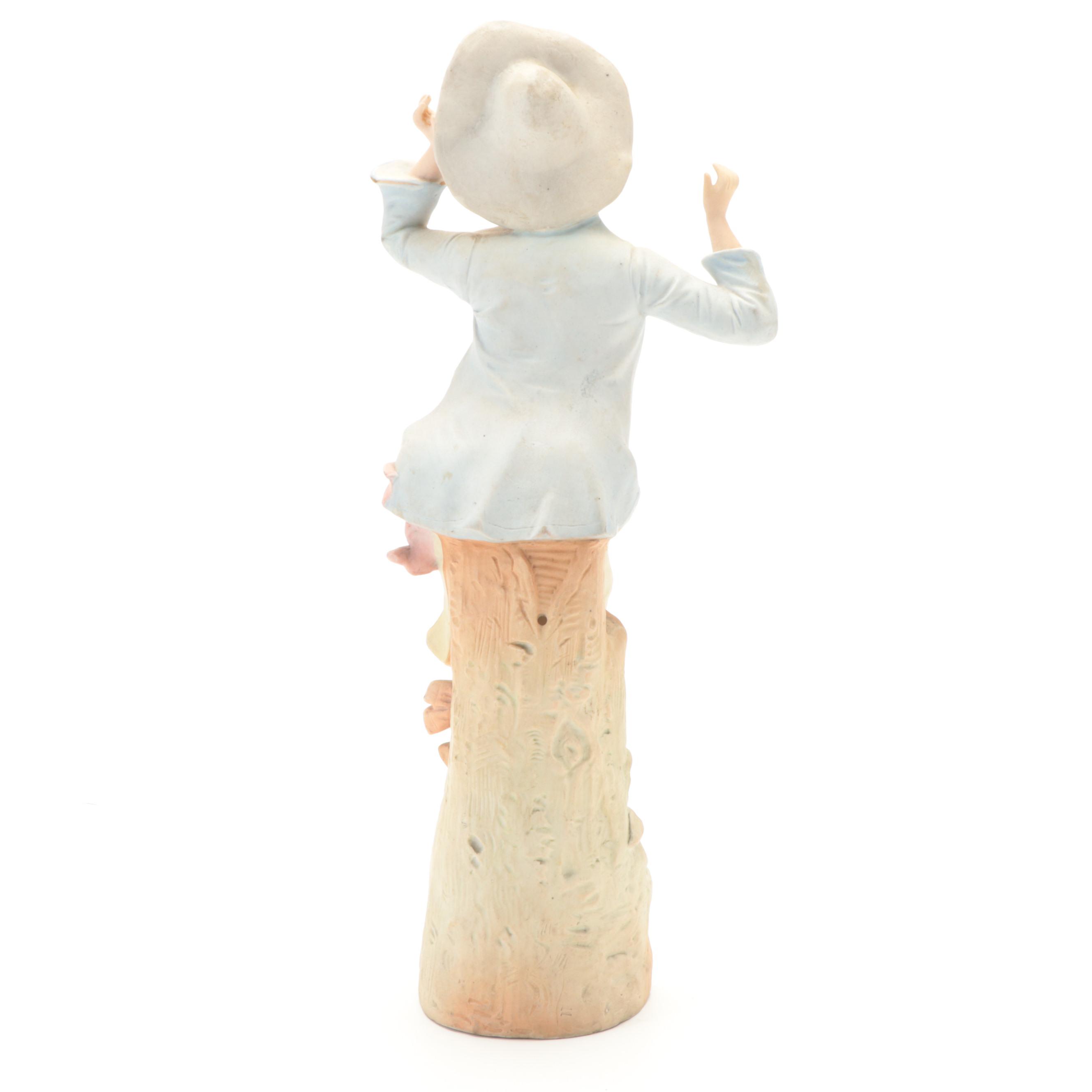 Pair of Hand-Painted Ceramic Figurines