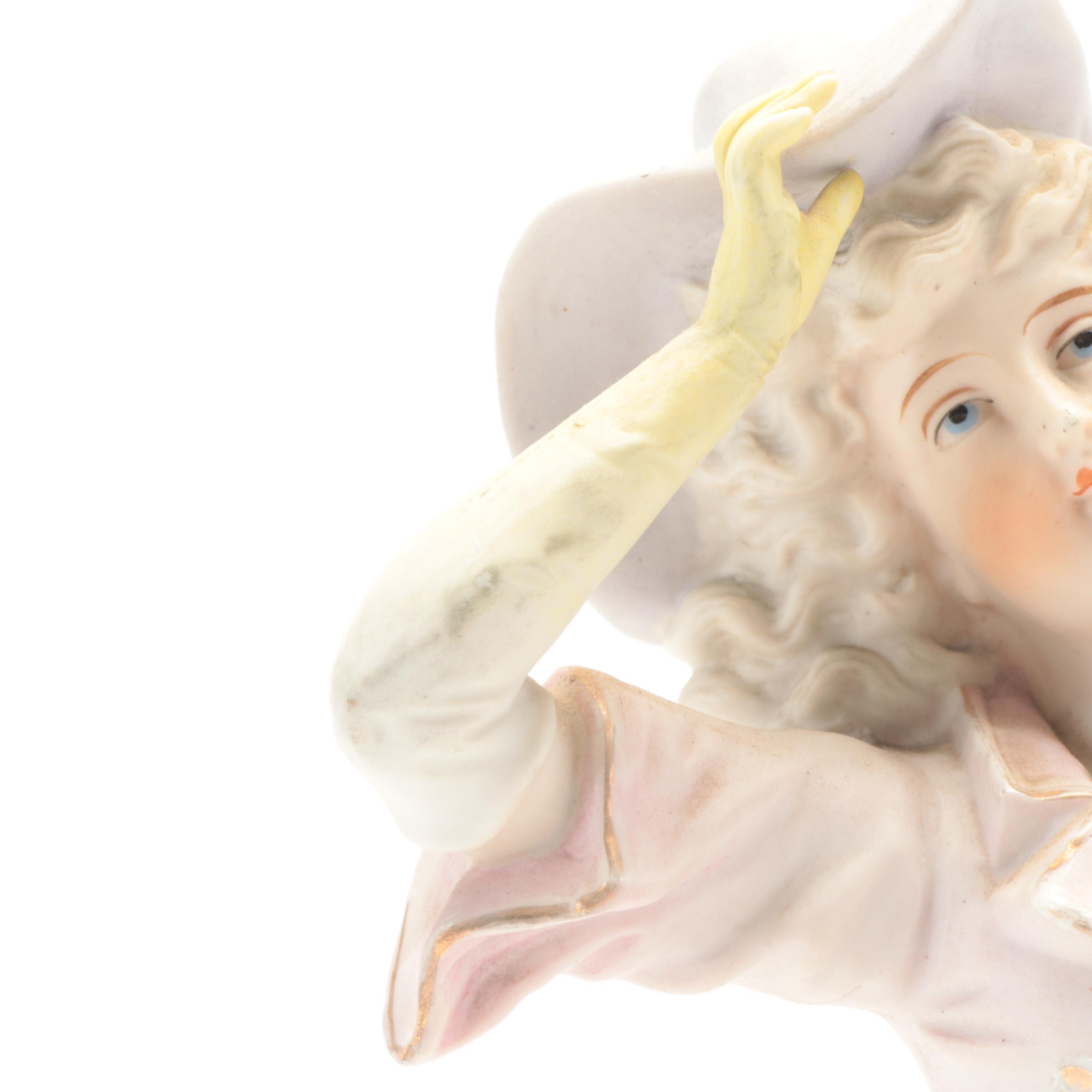 Pair of Hand-Painted Ceramic Figurines