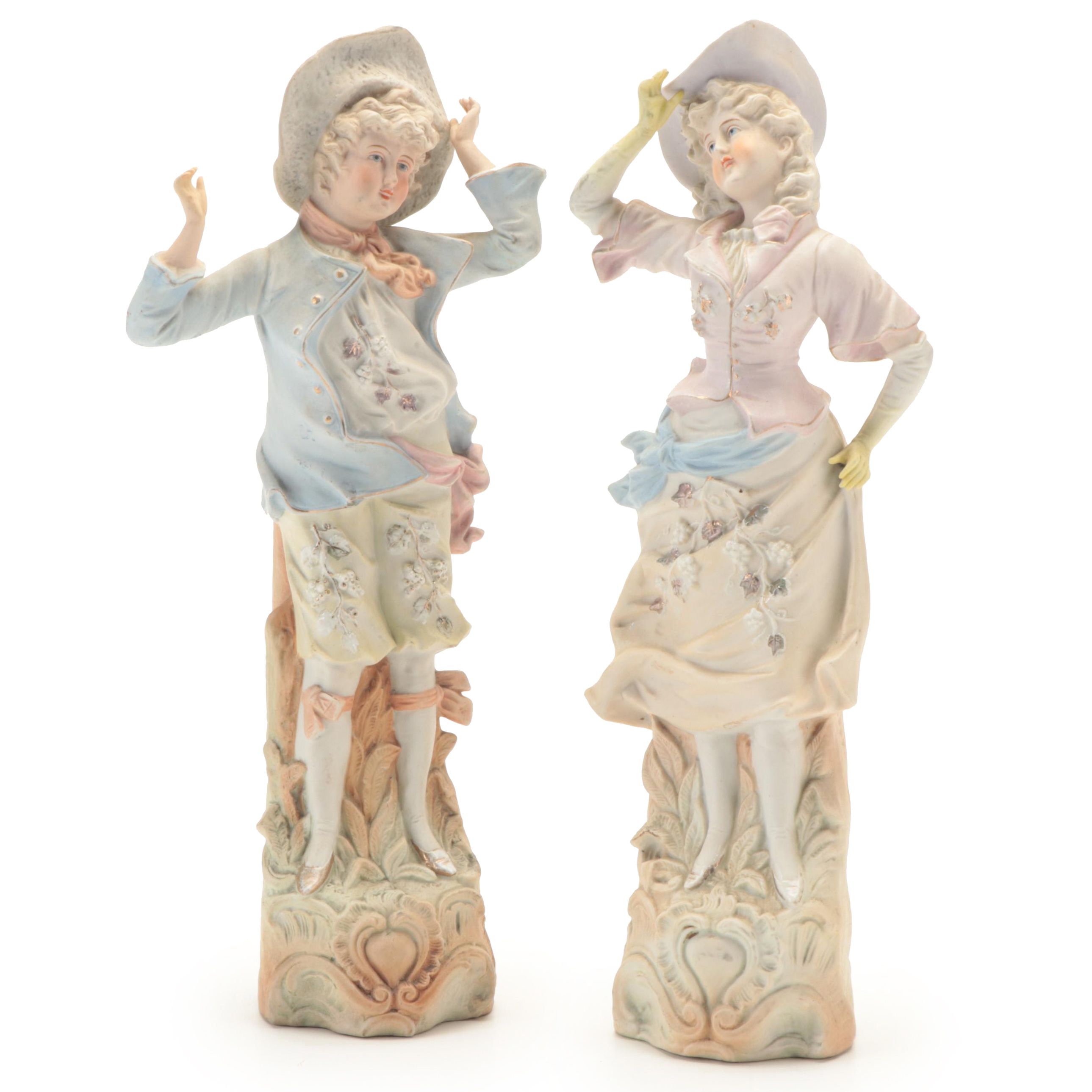 Pair of Hand-Painted Ceramic Figurines