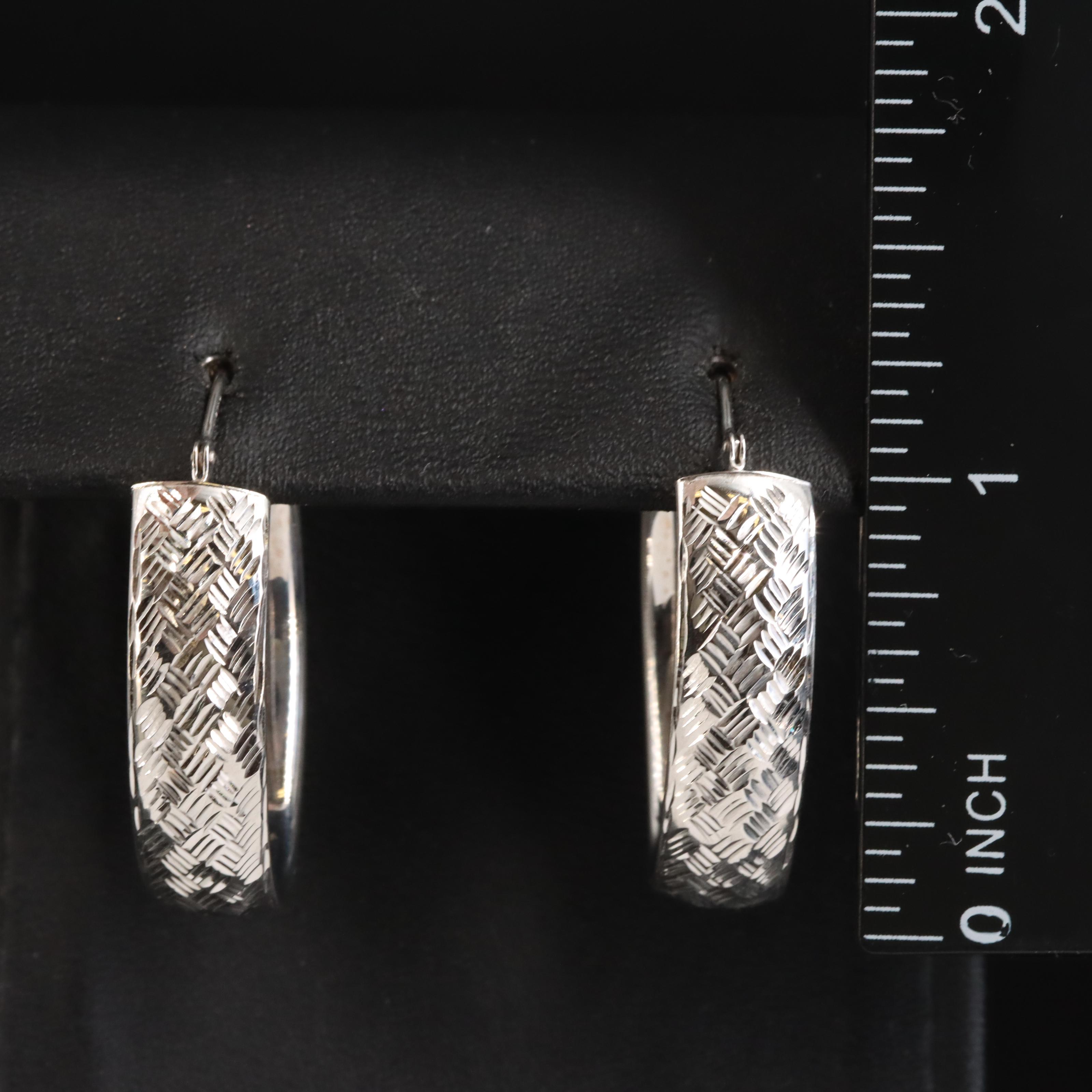 14K Elongated Hoop Earrings with Diamond Cut Finish