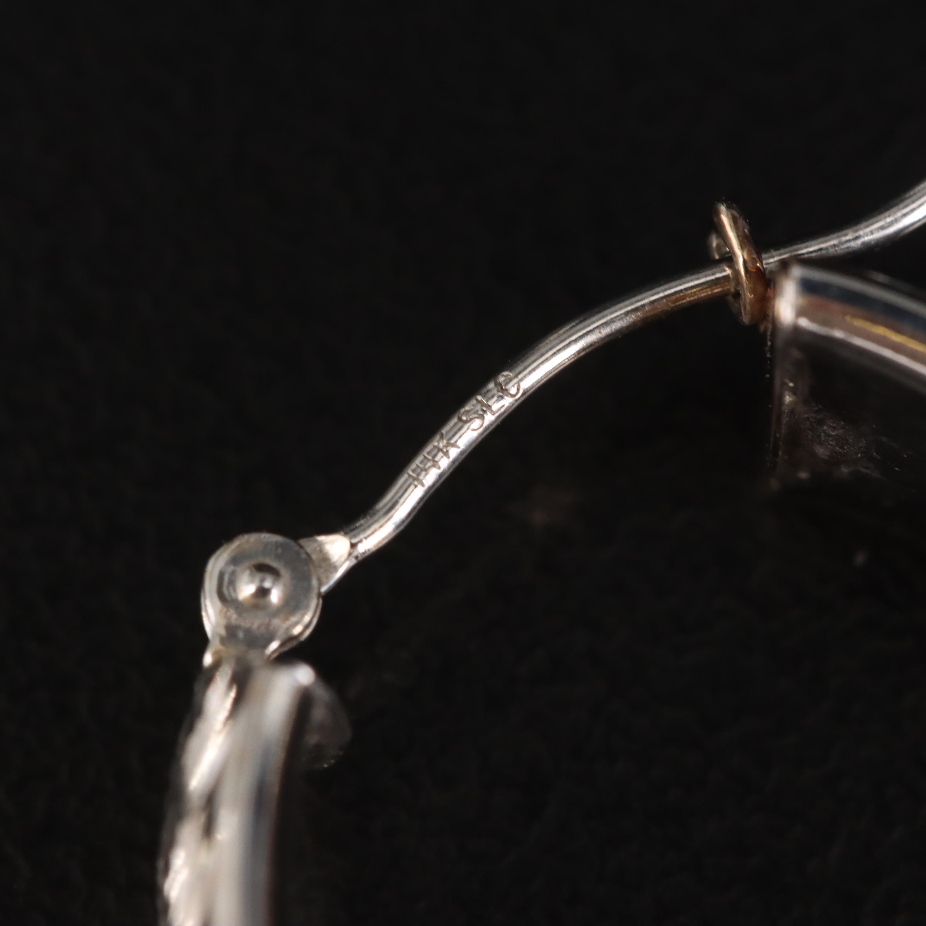 14K Elongated Hoop Earrings with Diamond Cut Finish