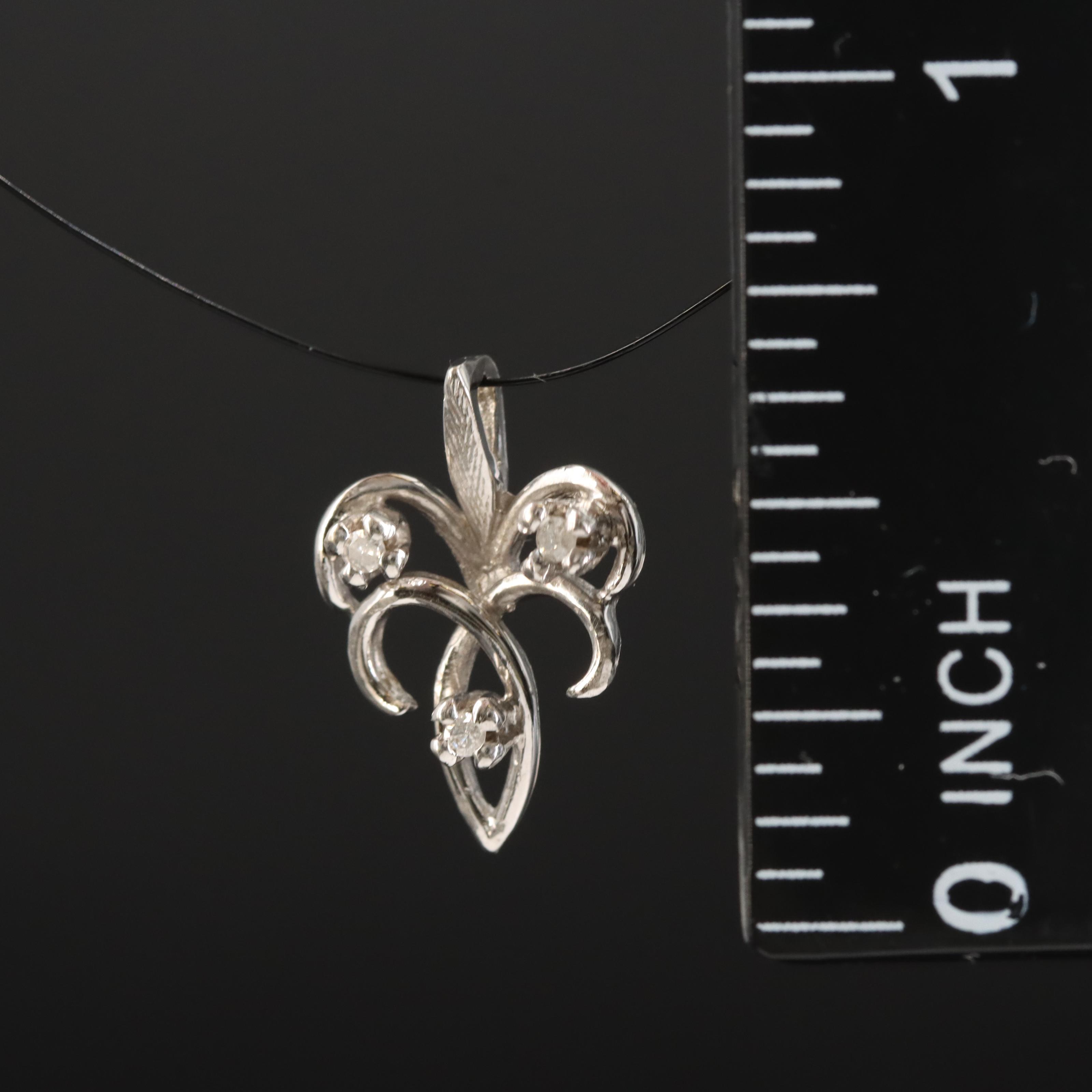 14K 0.03 CTW Diamond Pendant