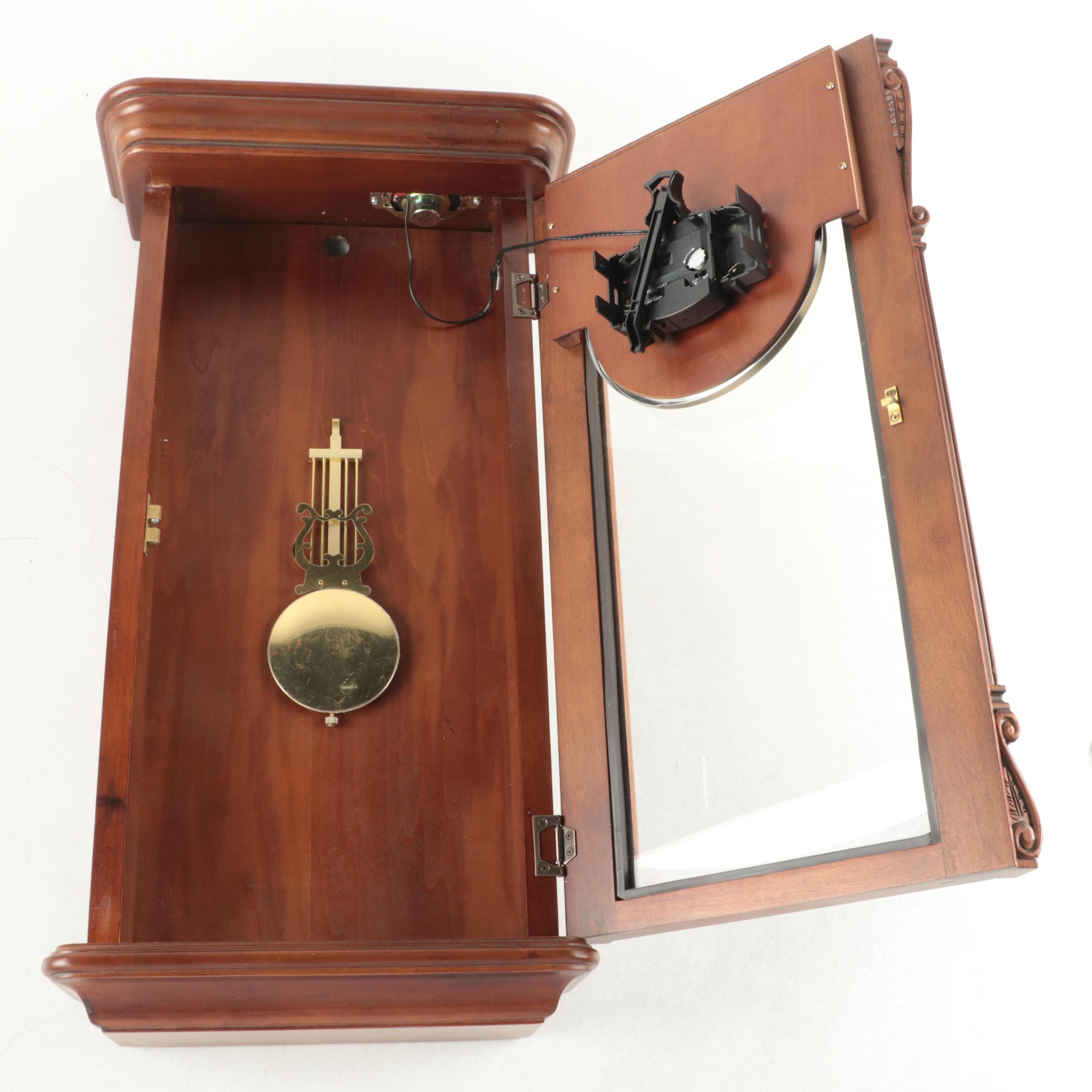 Howard Miller "Henderson" Wall Clock with Cherry Finish