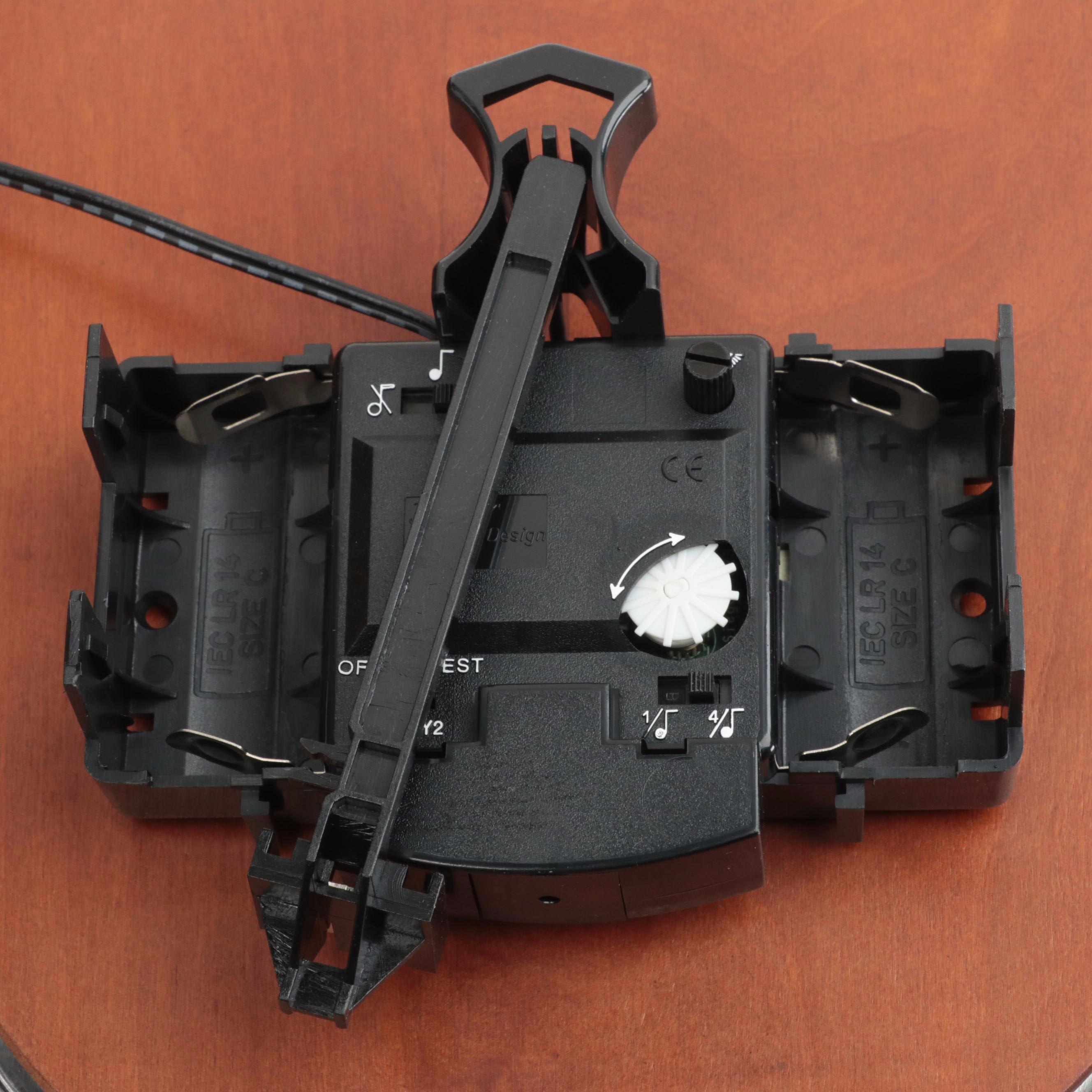 Howard Miller "Henderson" Wall Clock with Cherry Finish