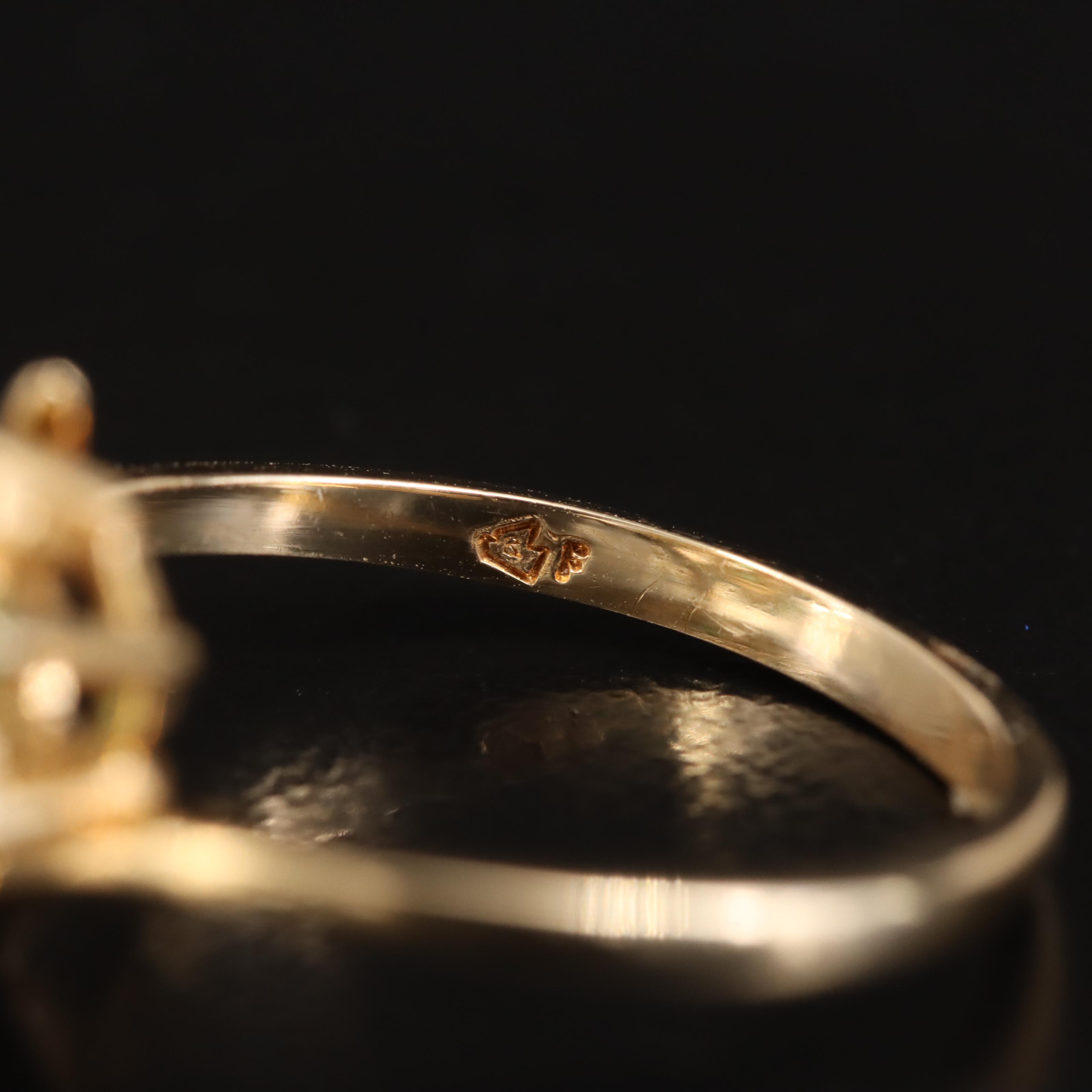 14K Diamond and Emerald Flower Bypass Ring