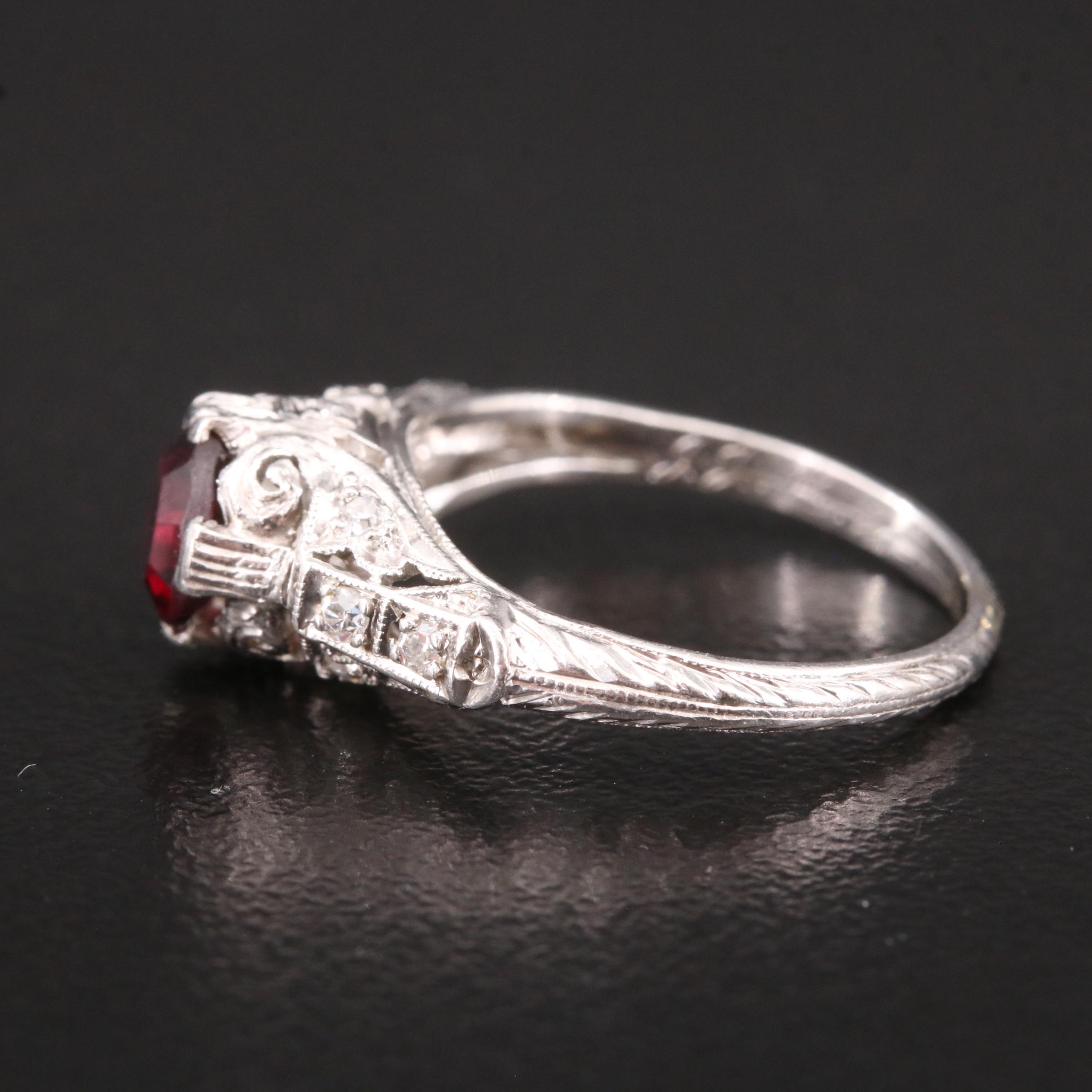Vintage Platinum Garnet and Diamond Scrollwork Ring