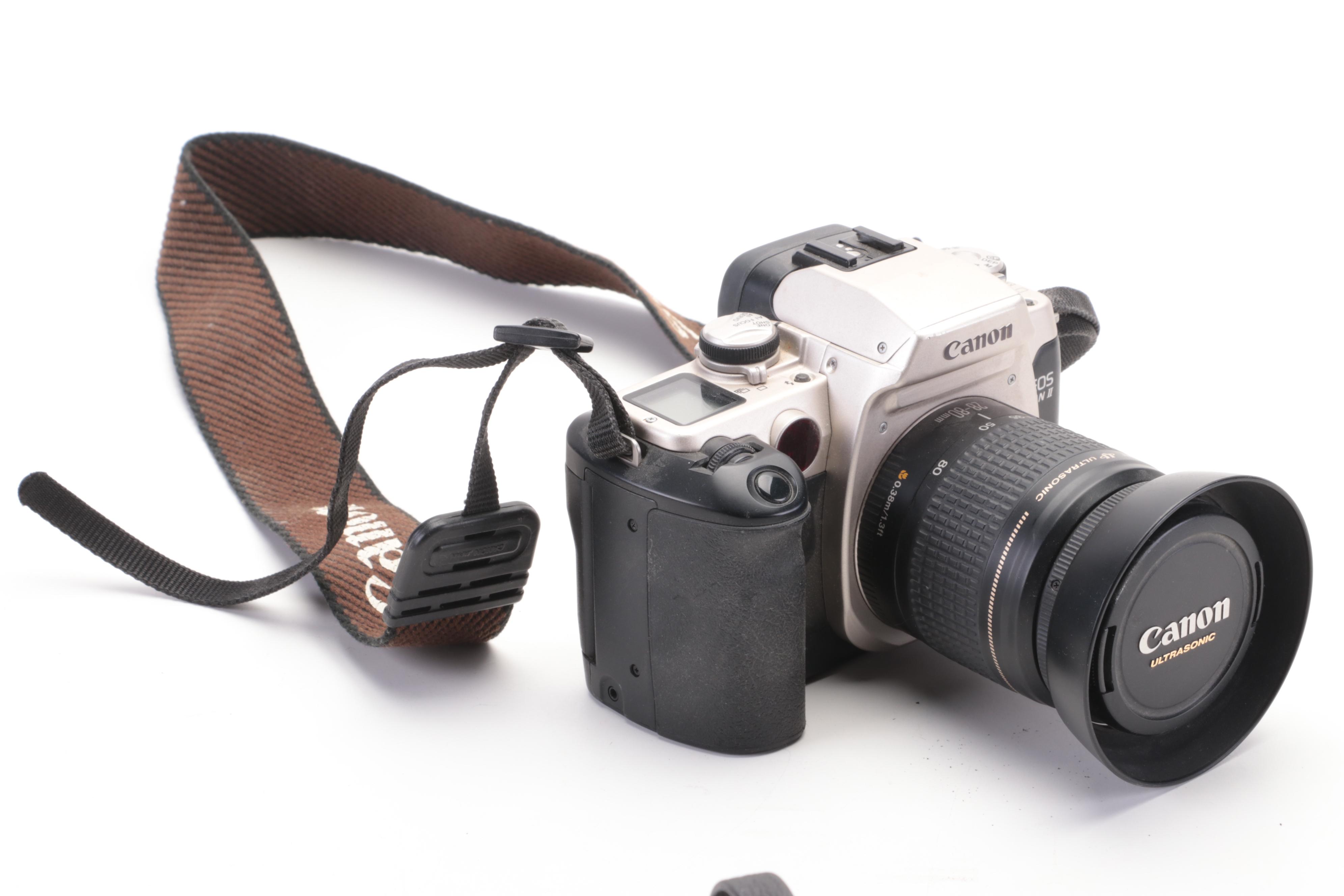 Canon EOS Elan II and Other Cameras with Lens and Accessory Collection