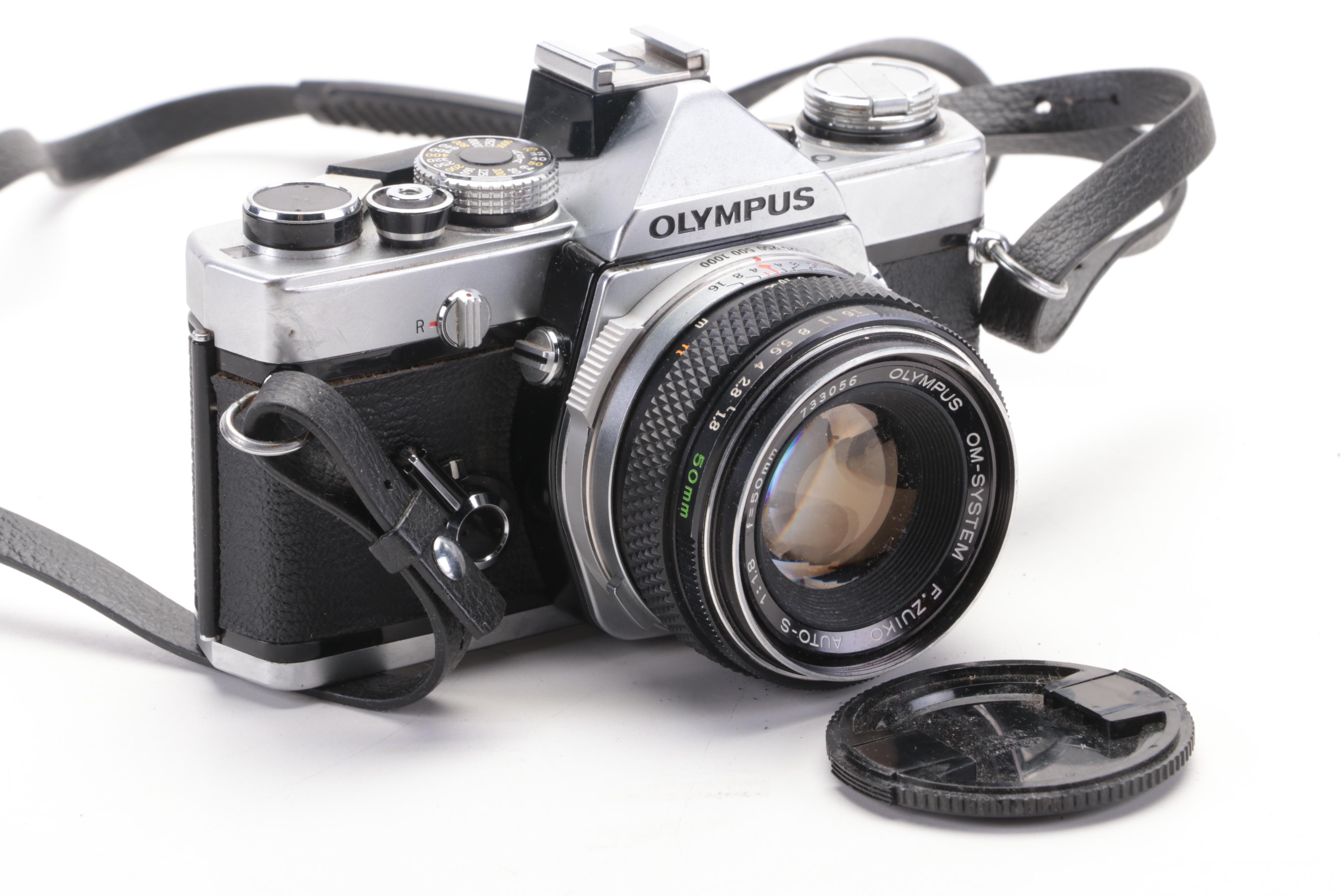 Canon EOS Elan II and Other Cameras with Lens and Accessory Collection