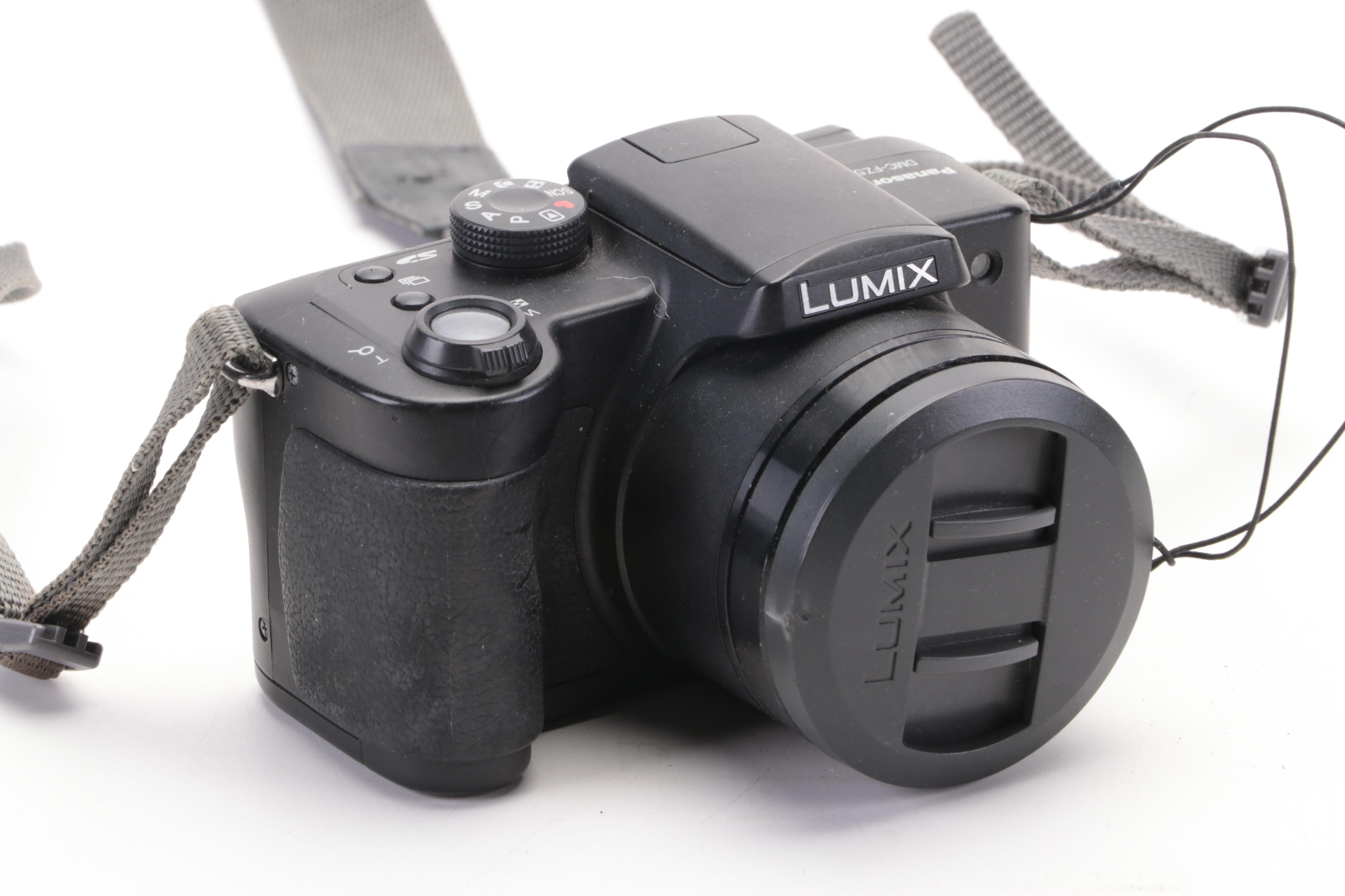 Canon EOS Elan II and Other Cameras with Lens and Accessory Collection