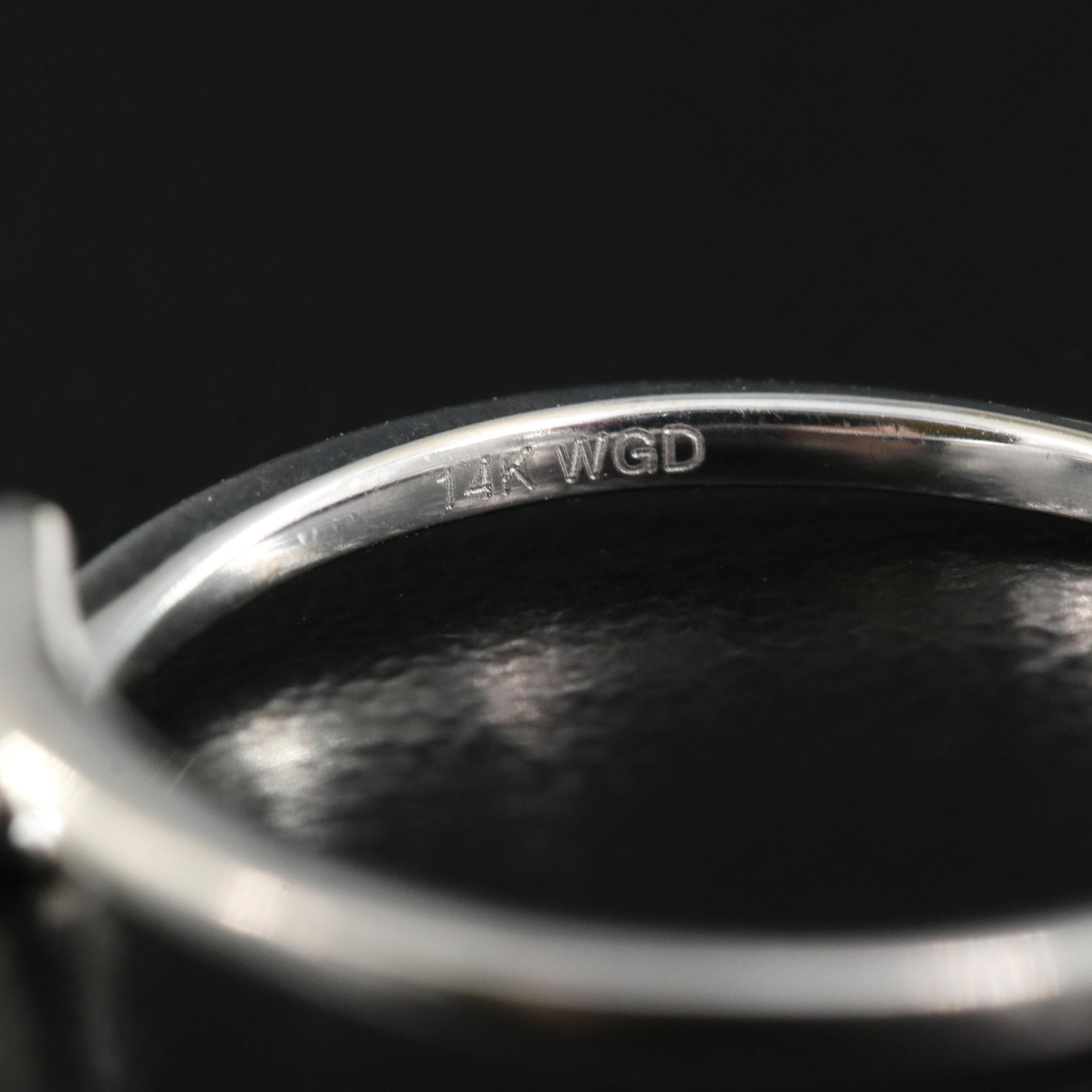 14K 0.09 CT Diamond Bypass Ring