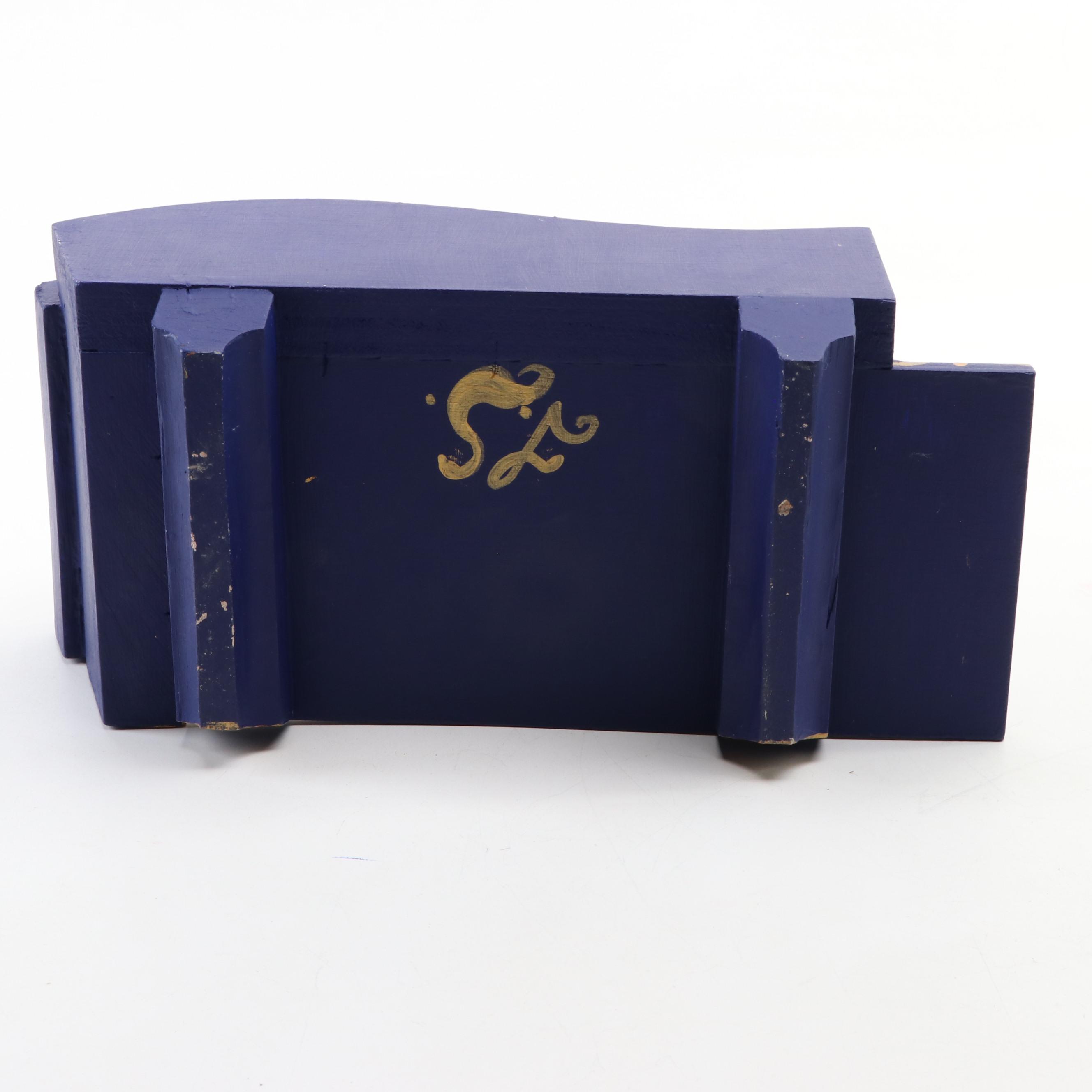 Artist Doll on Chaise Lounge