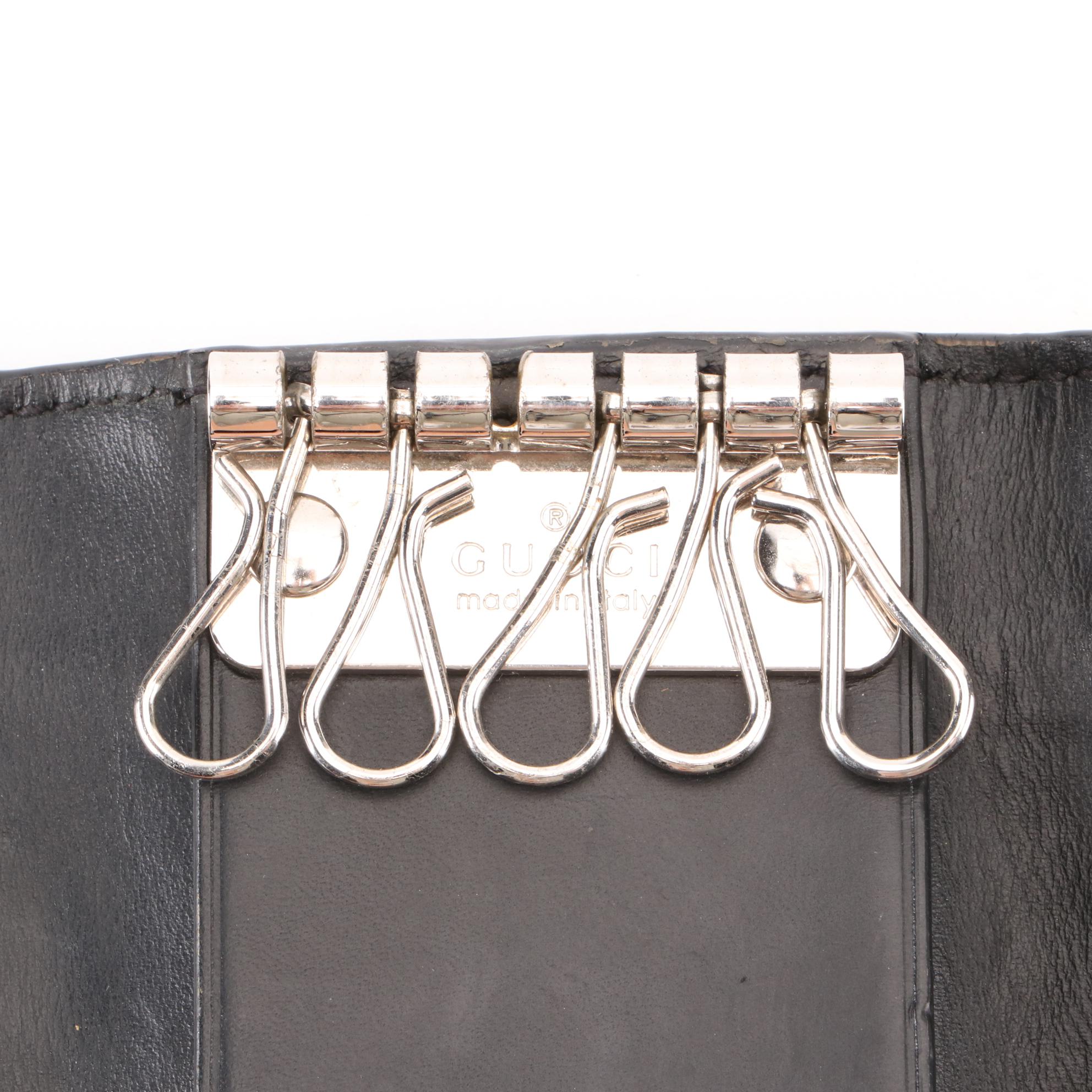 Gucci Key Holder in Black Guccissima Leather and Web Trim