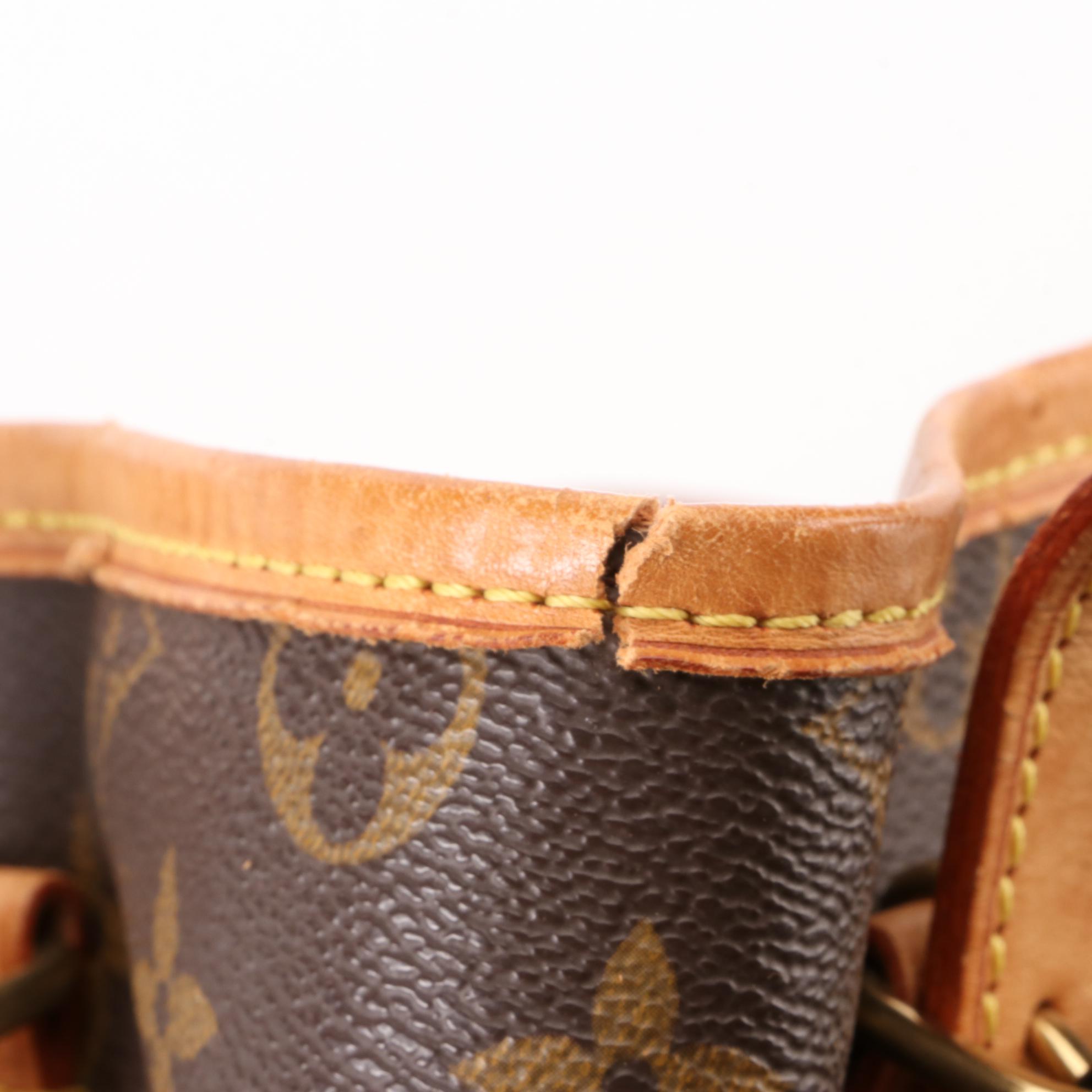 Louis Vuitton Bucket Bag in Monogram Canvas and Vachetta Leather