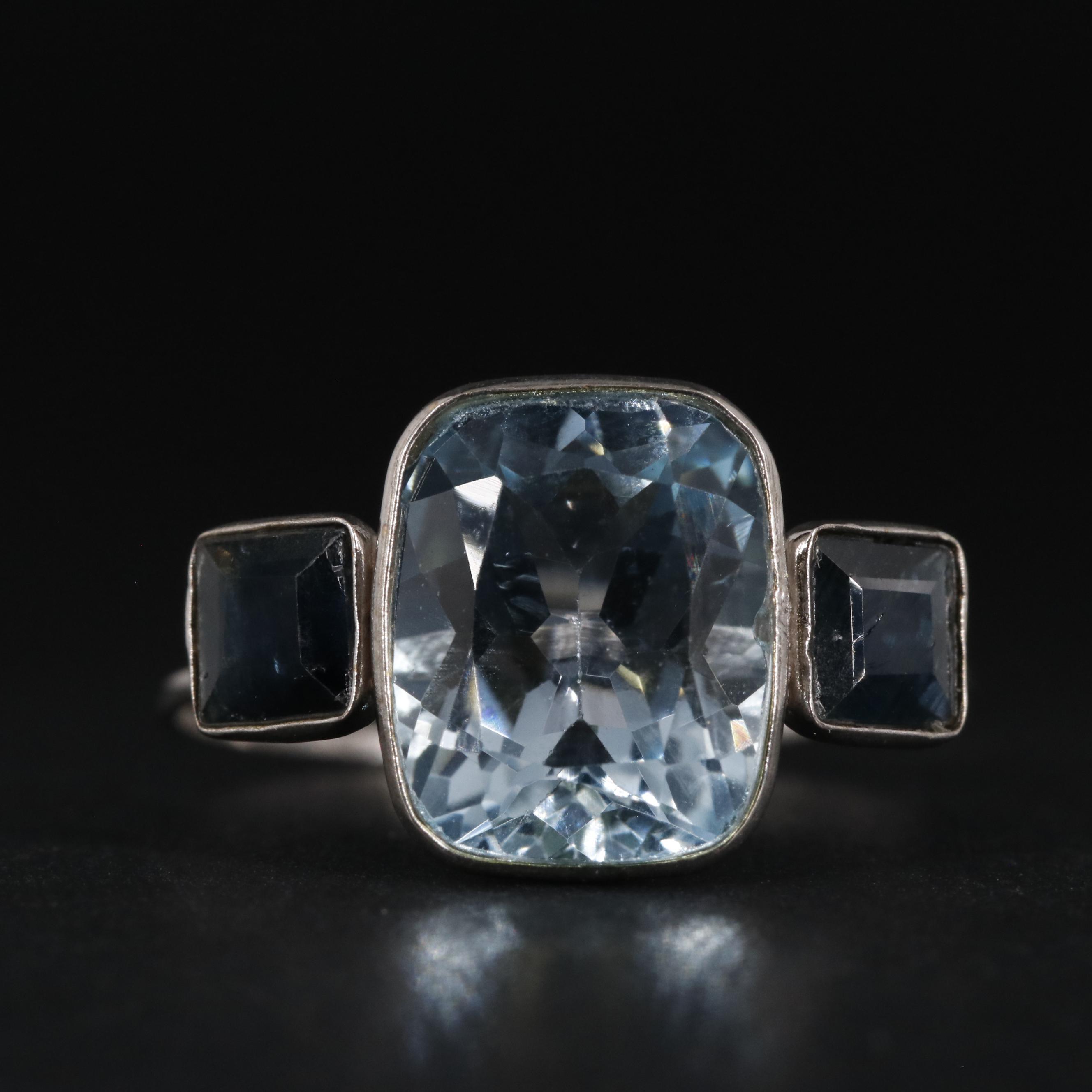 14K 4.28 CTW Topaz and Sapphire Ring