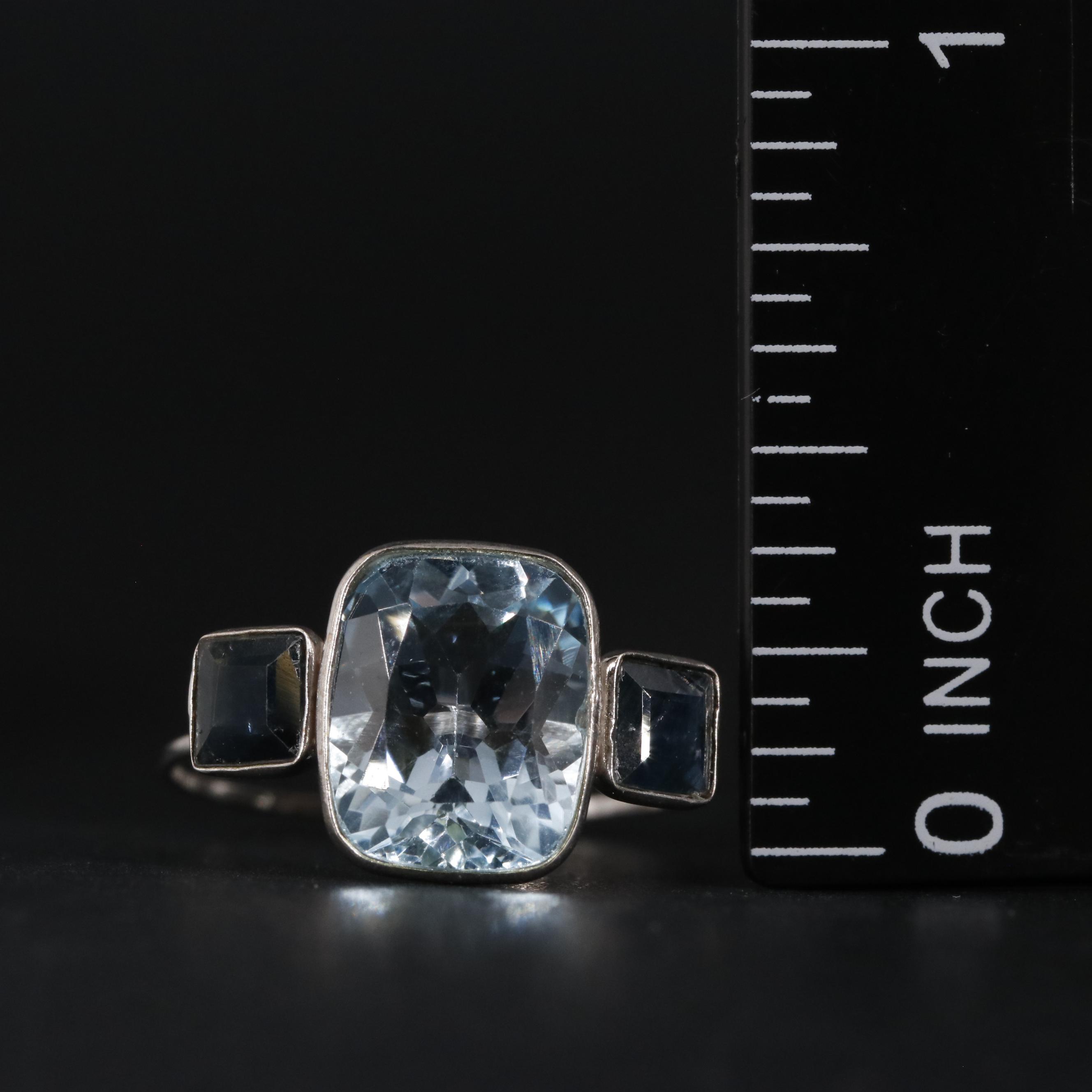 14K 4.28 CTW Topaz and Sapphire Ring