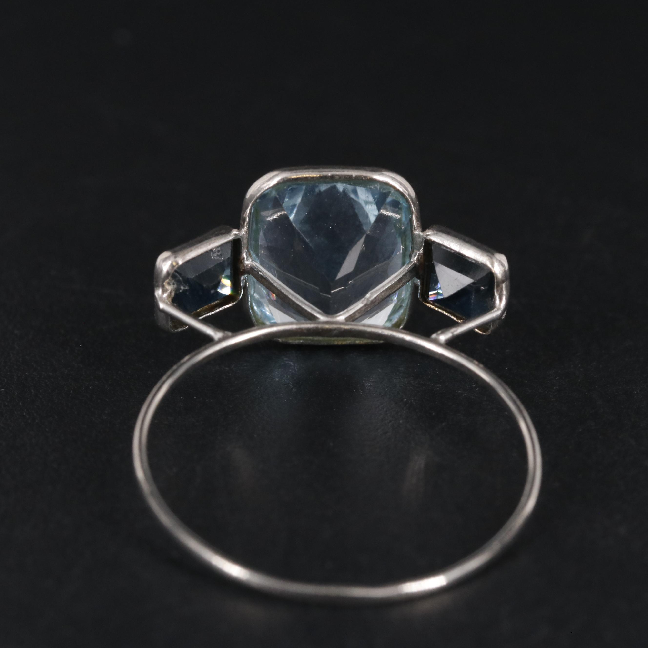 14K 4.28 CTW Topaz and Sapphire Ring