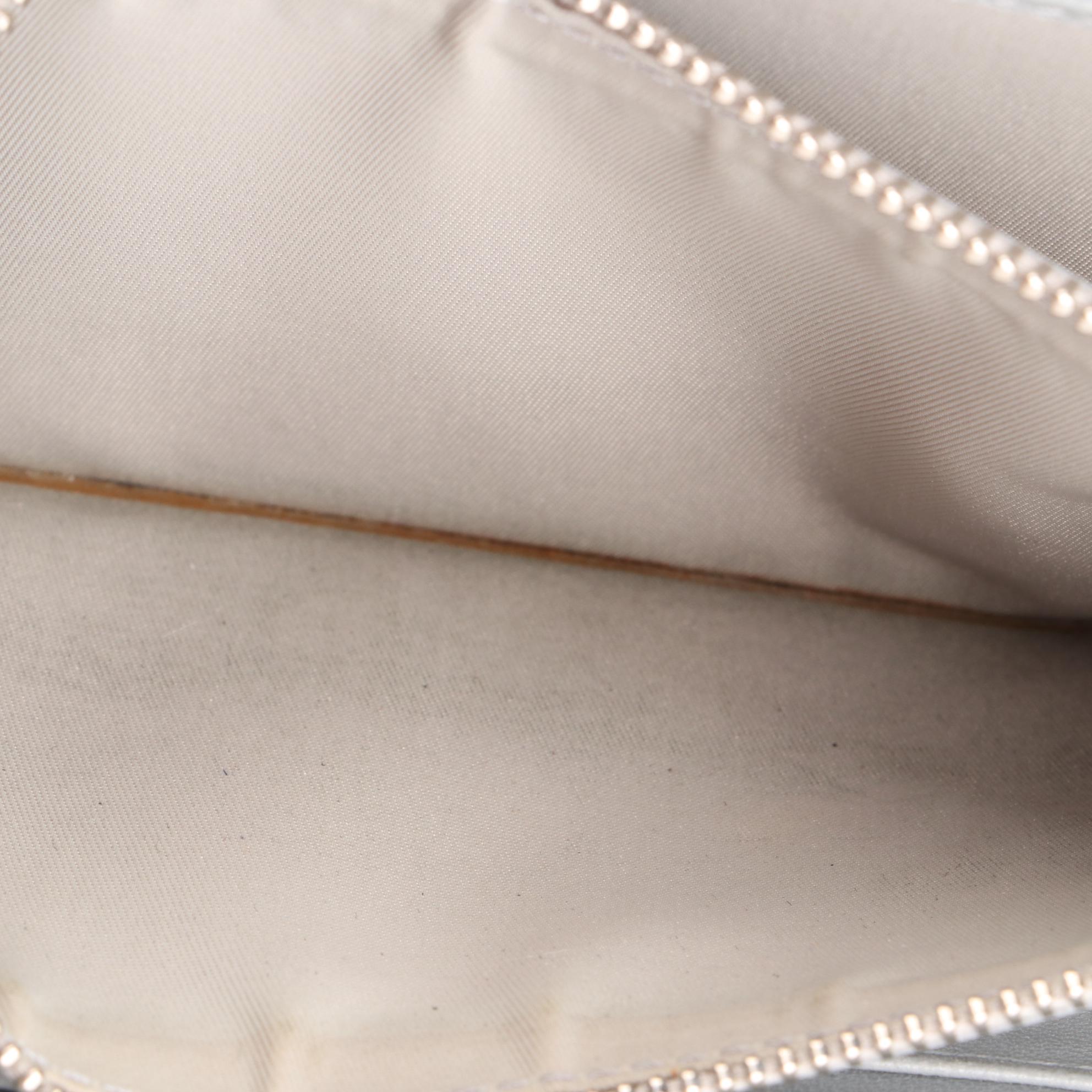 Christian Dior Zipped Wallet in Oblique Embossed Patent Leather