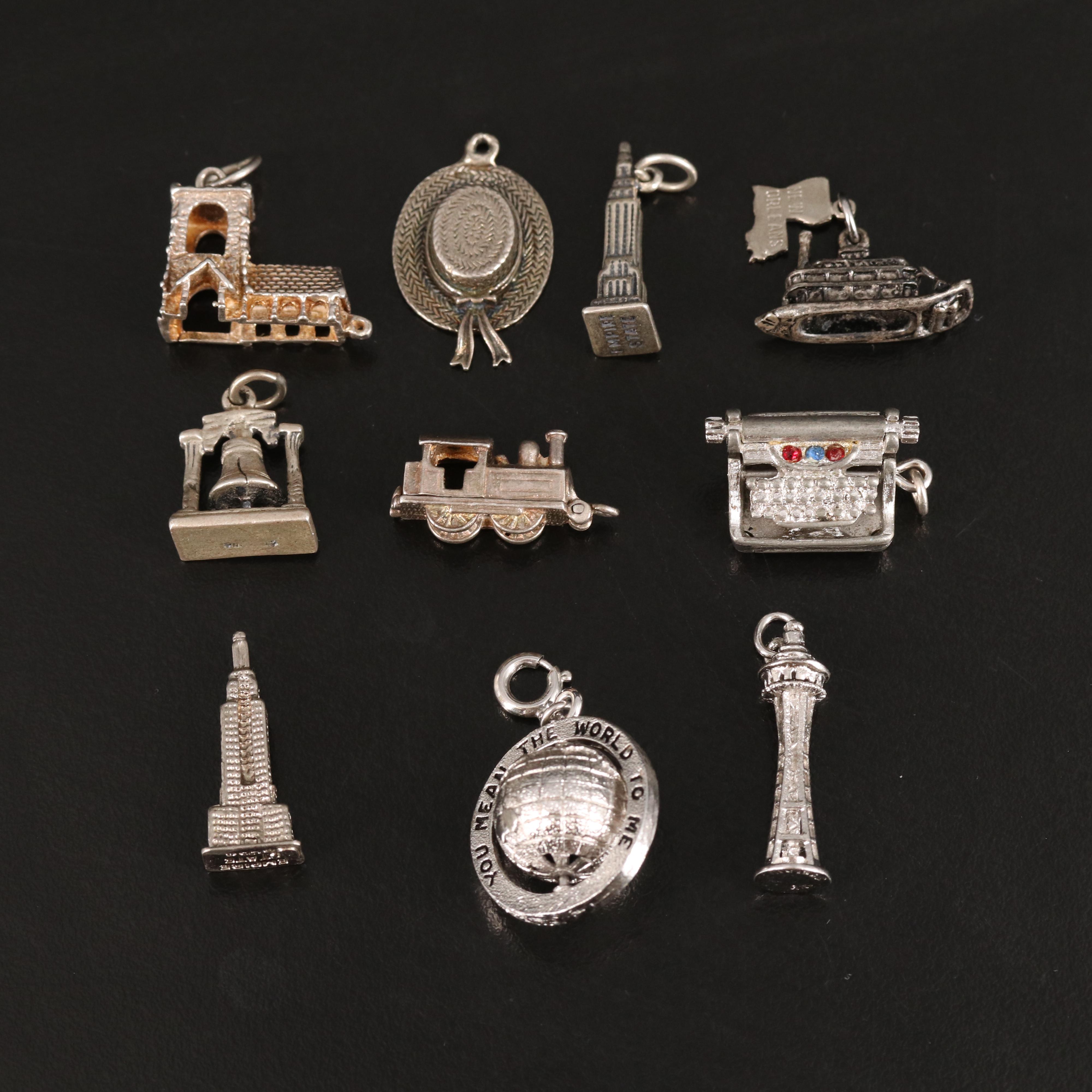 Vintage Sterling Charm Grouping Including Travel
