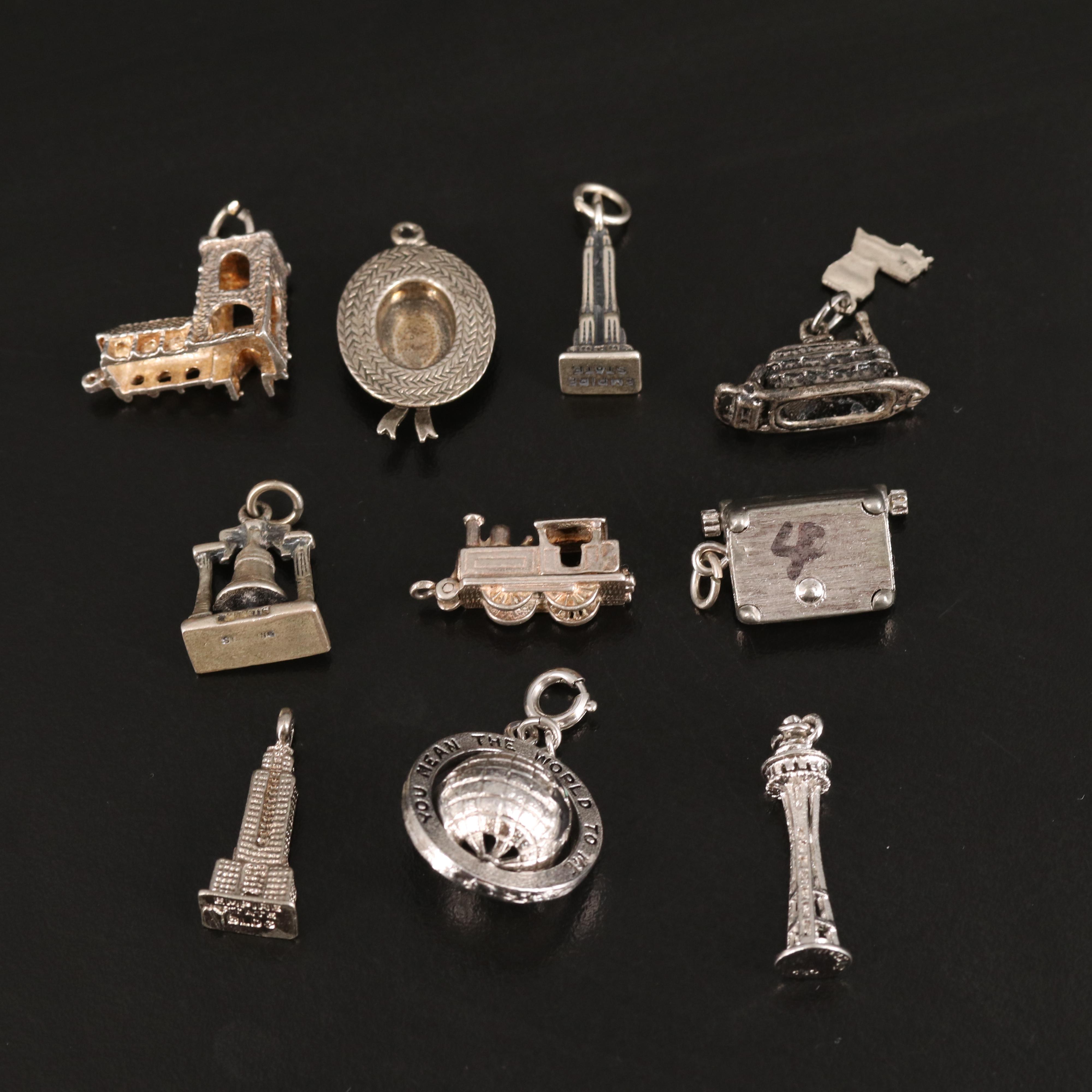 Vintage Sterling Charm Grouping Including Travel