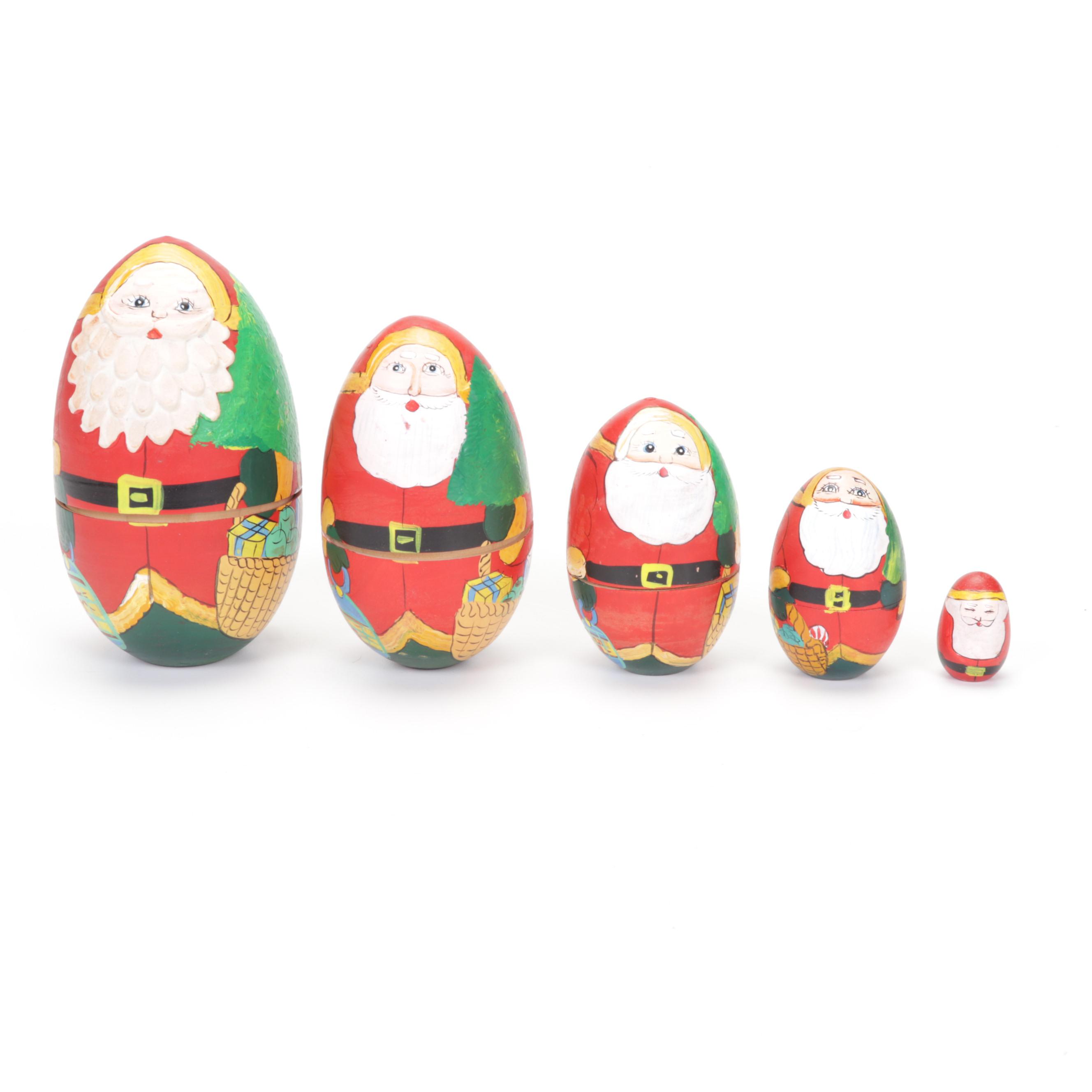 Three Sets of Russian Wooden Santa Nesting Dolls