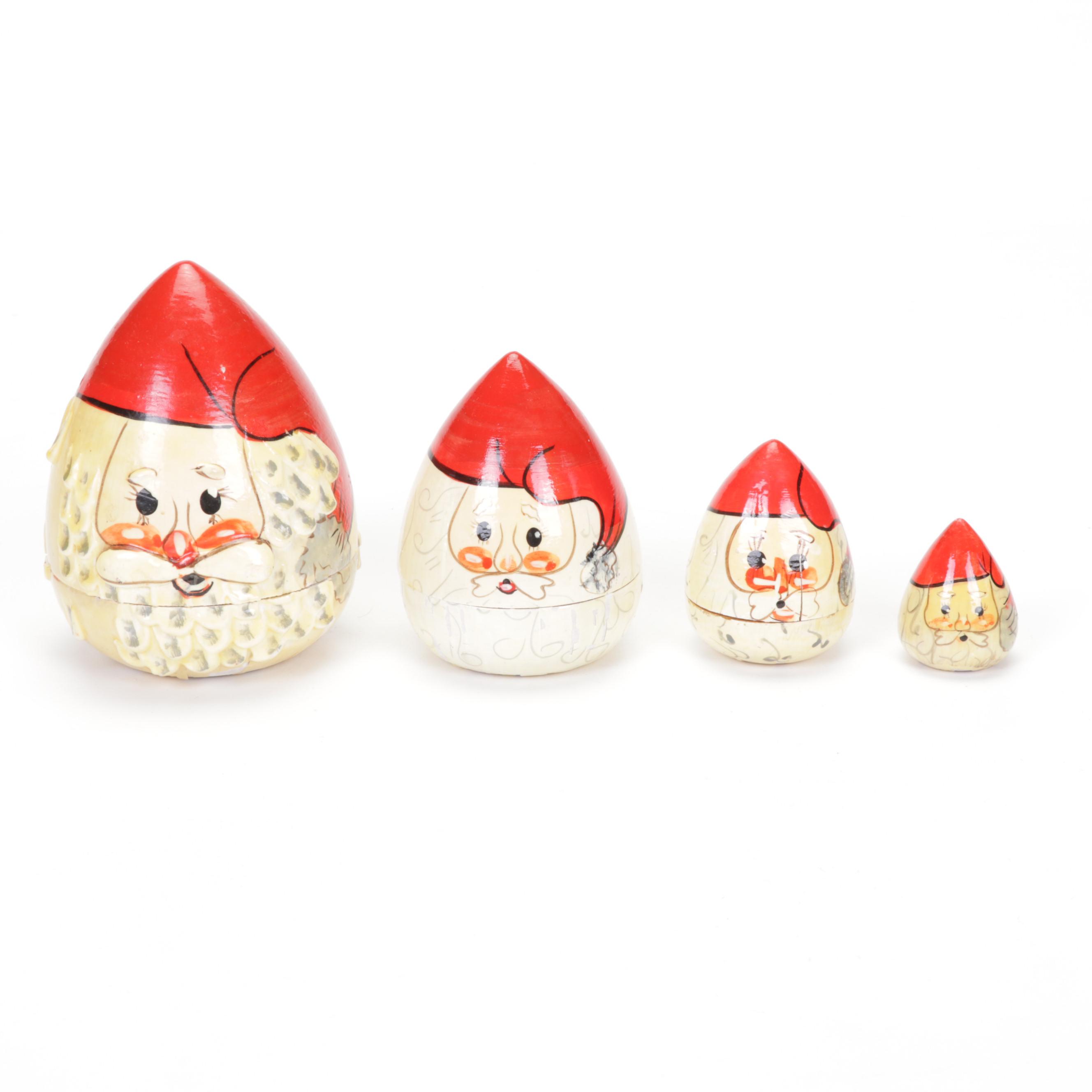 Three Sets of Russian Wooden Santa Nesting Dolls