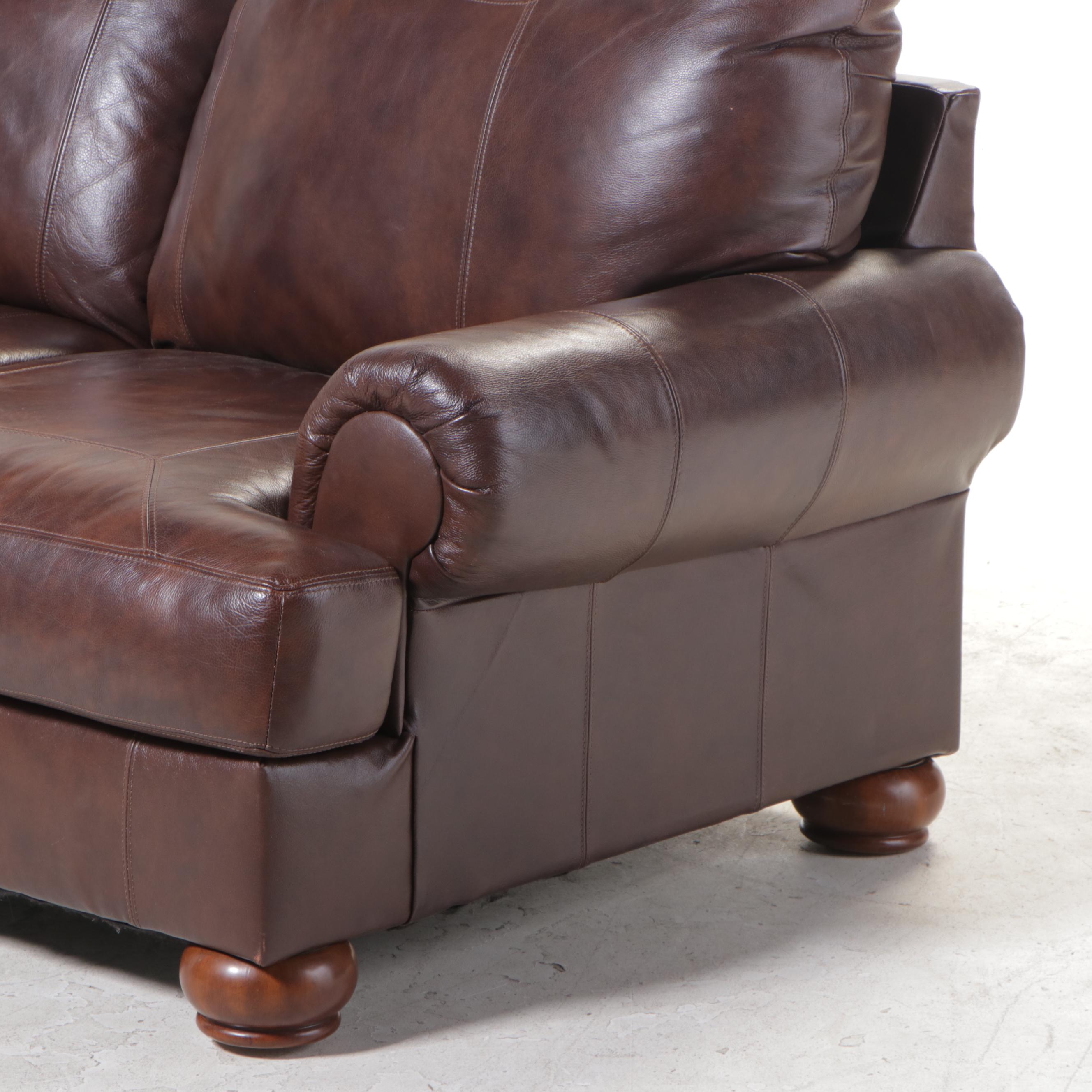 Ashley Furniture Brown Leather Roll-Arm Sofa