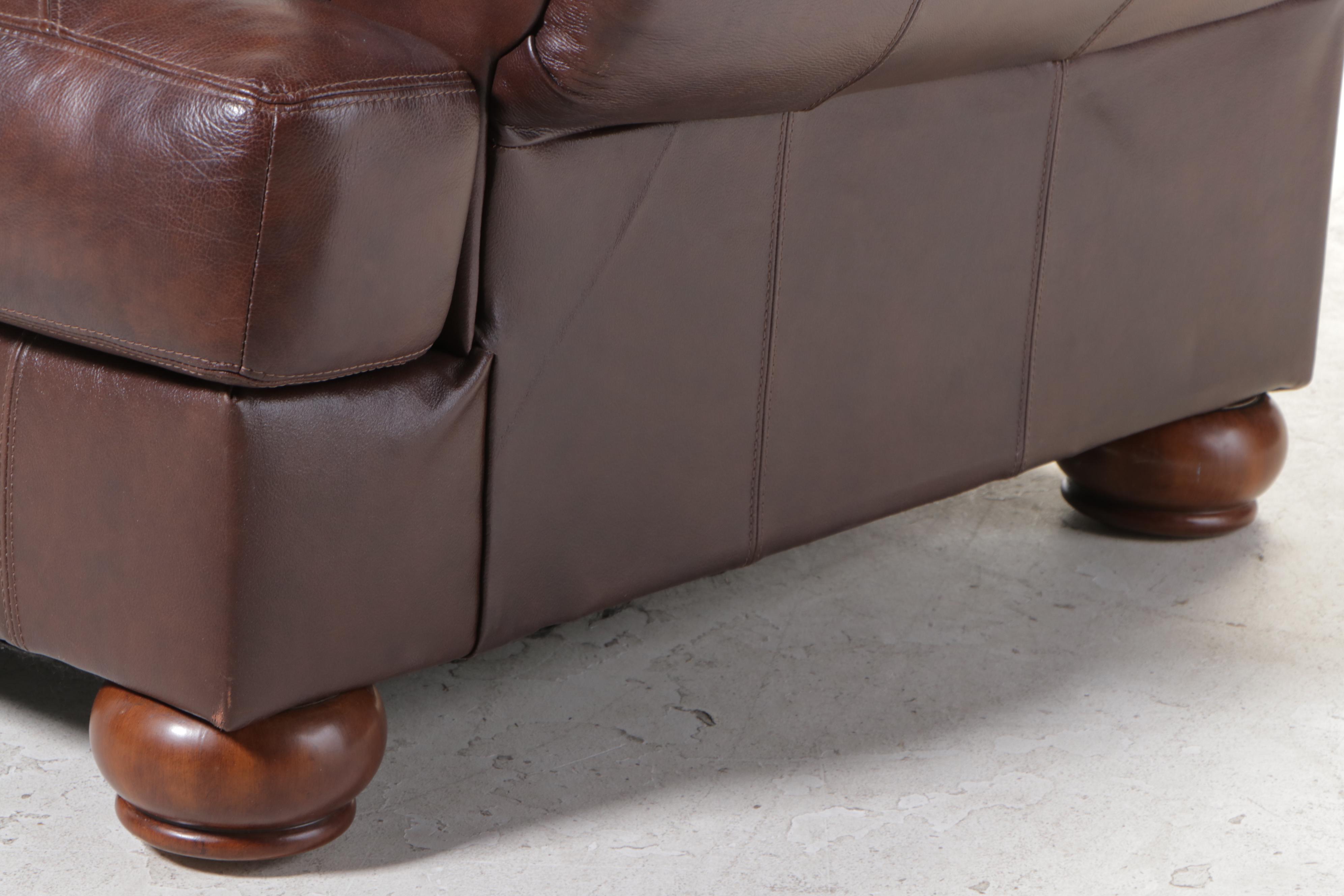 Ashley Furniture Brown Leather Roll-Arm Sofa