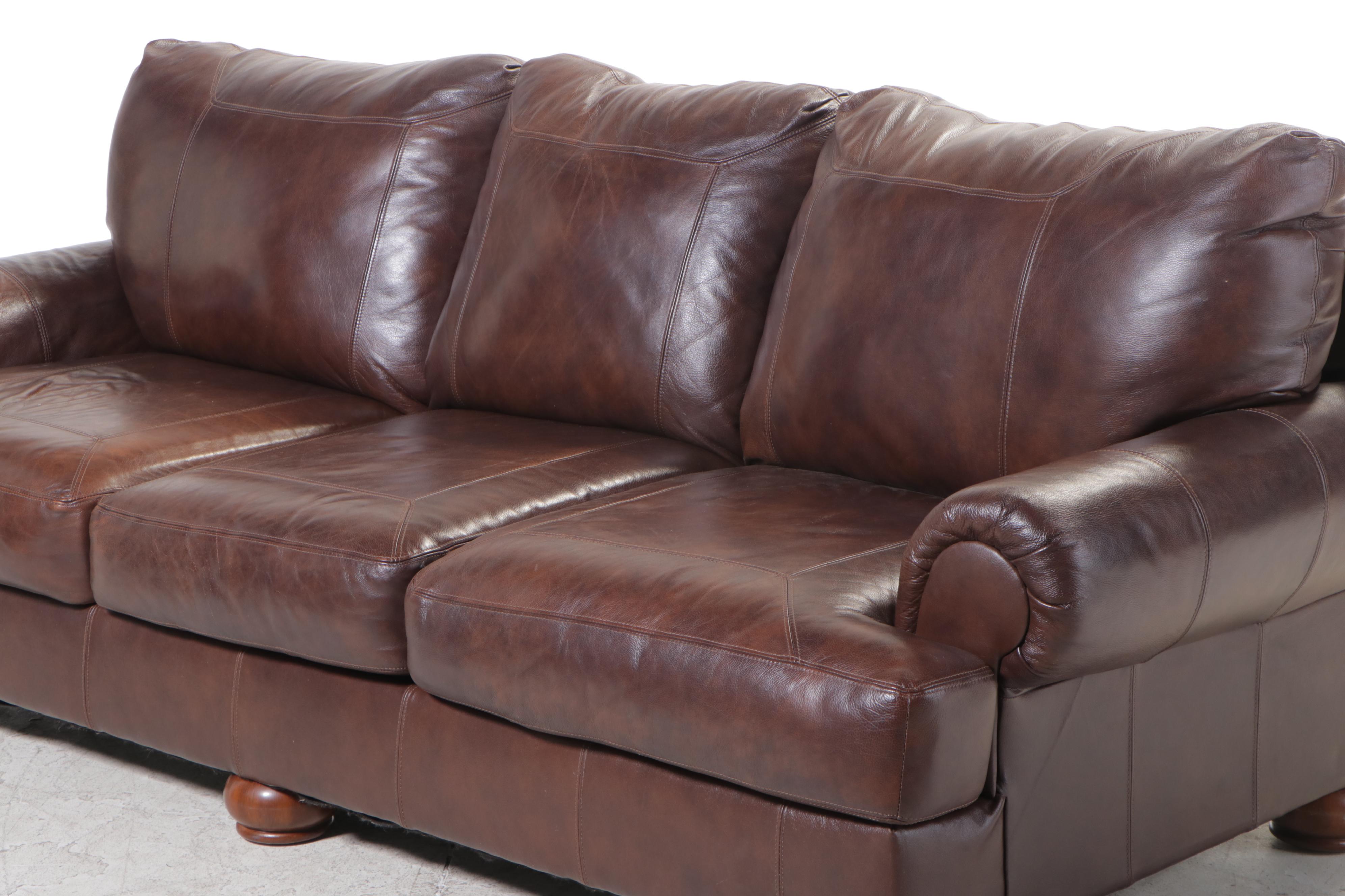 Ashley Furniture Brown Leather Roll-Arm Sofa