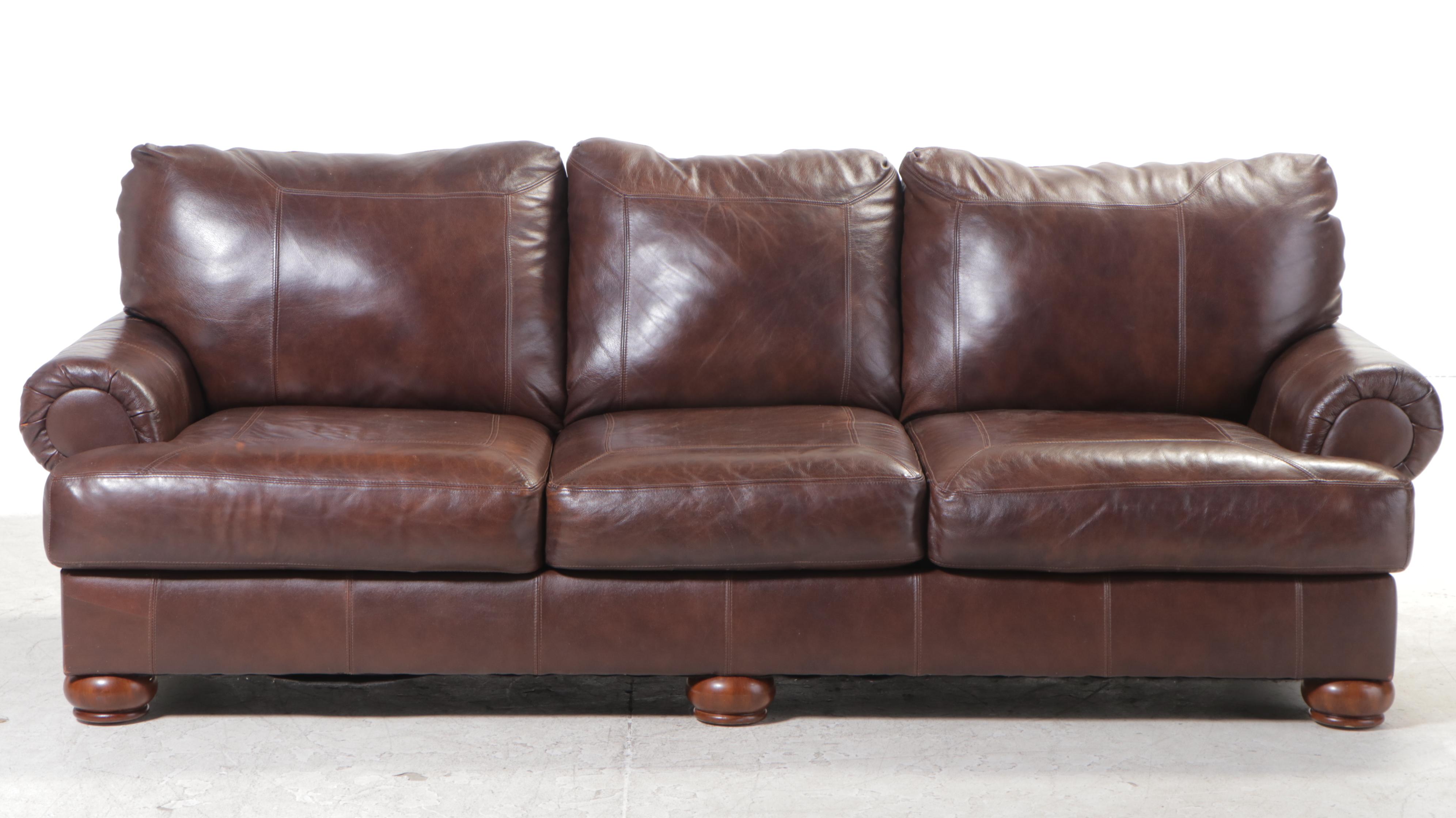 Ashley Furniture Brown Leather Roll-Arm Sofa