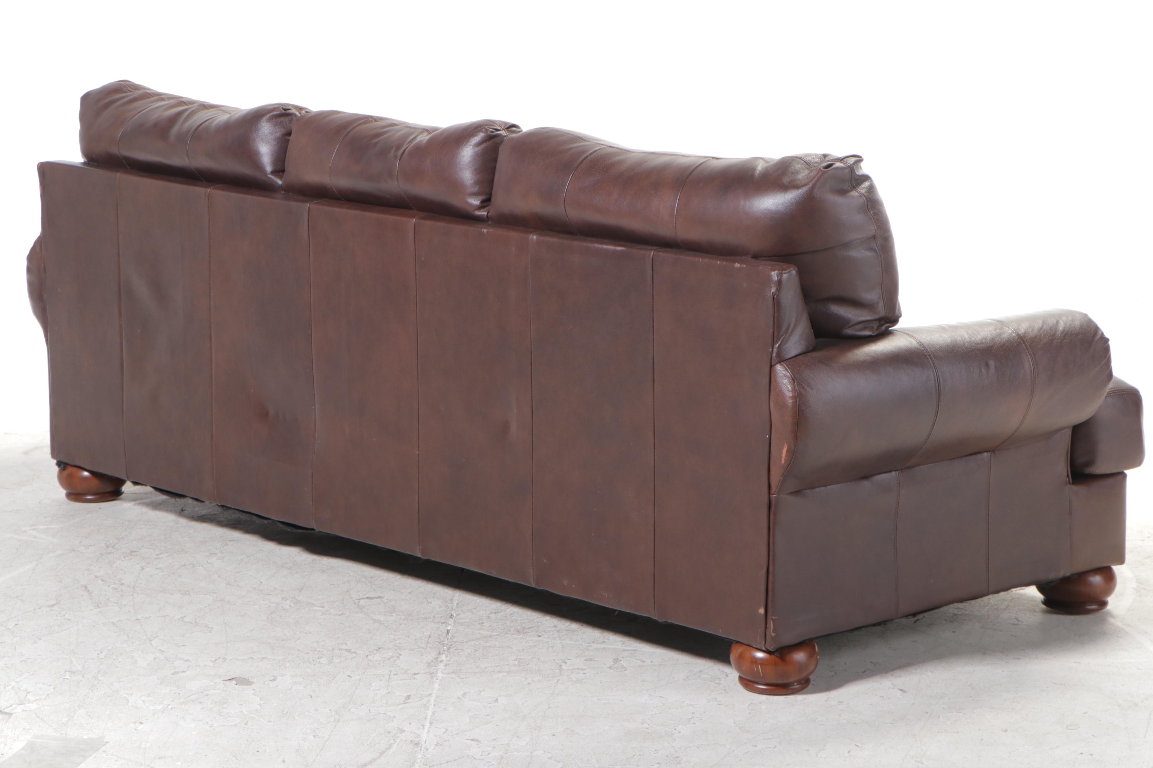 Ashley Furniture Brown Leather Roll-Arm Sofa