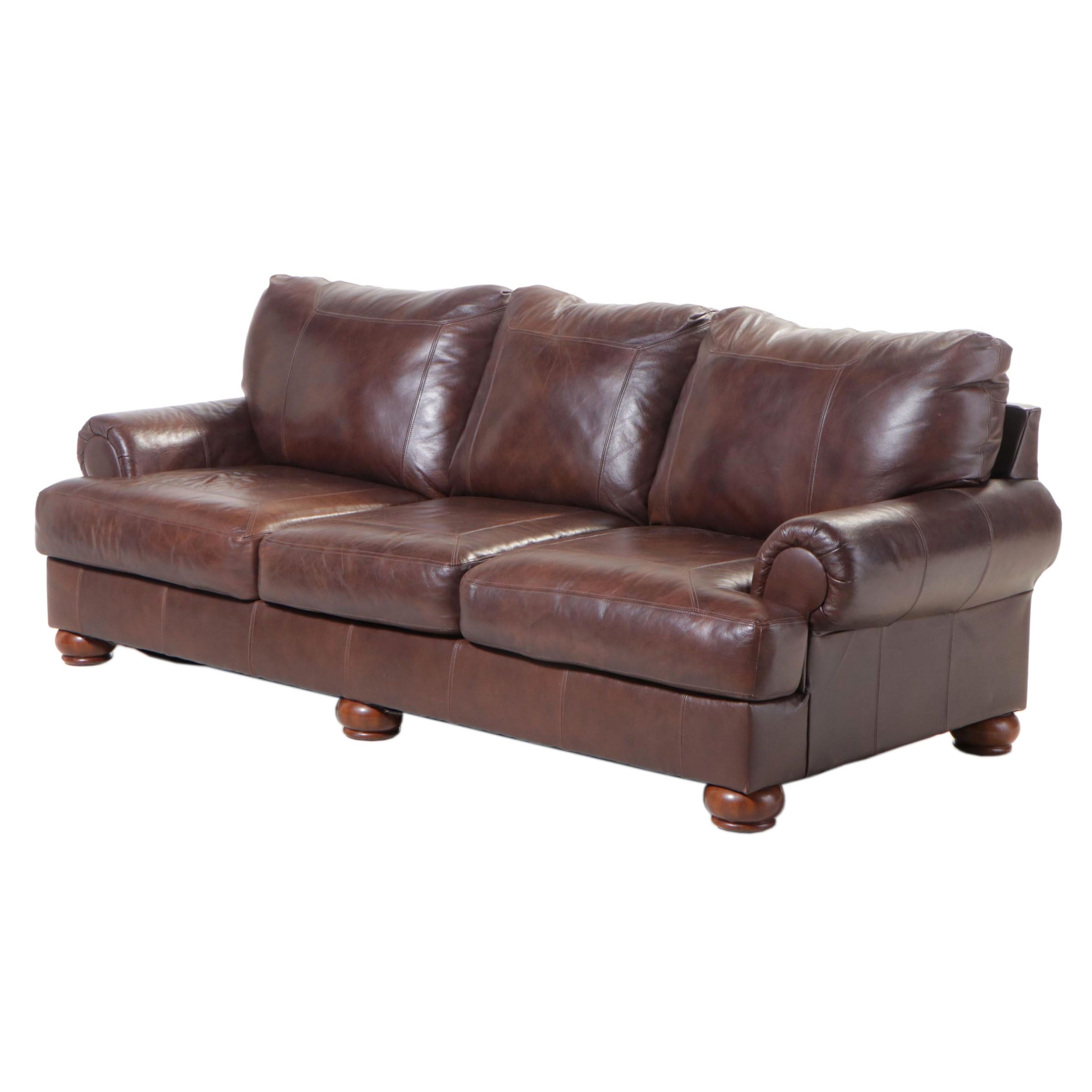 Ashley Furniture Brown Leather Roll-Arm Sofa