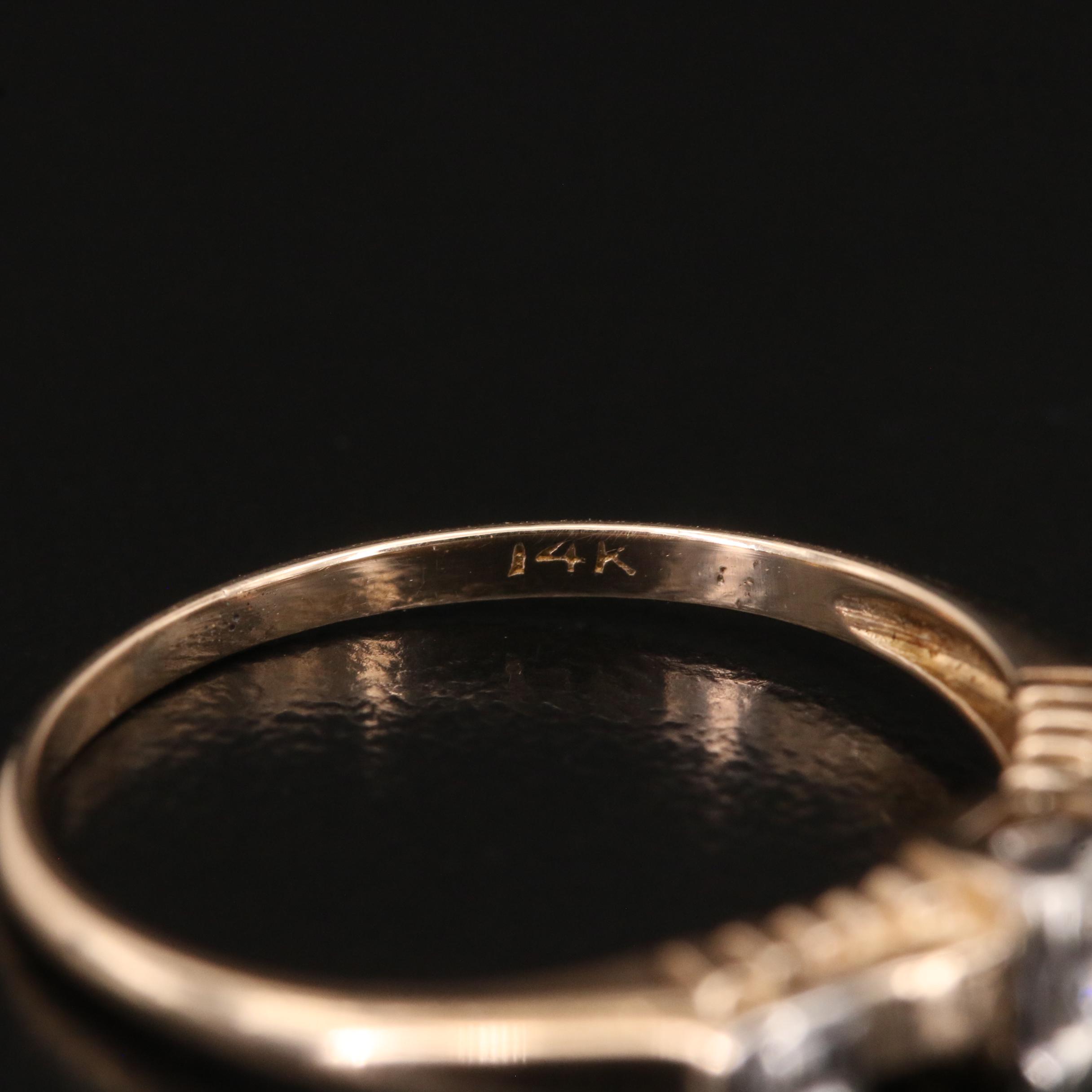 14K 0.10 CT Diamond Ring